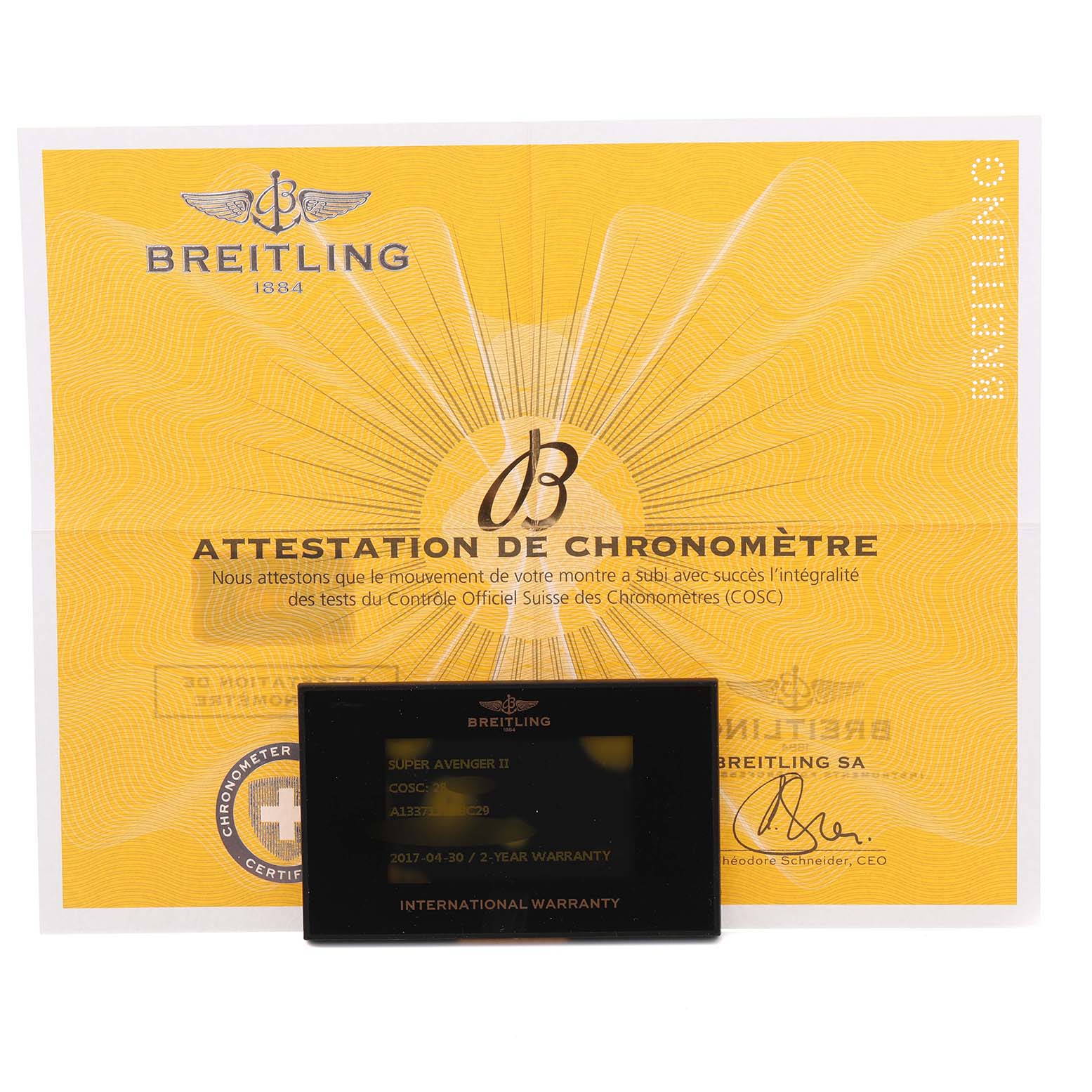 The image shows a Breitling Avenger A1337111/BC29 Men
s Stainless Steel Black Dial A1337111/BC29 Men
s Stainless Steel Black Dial warranty card and chronometer certificate.
