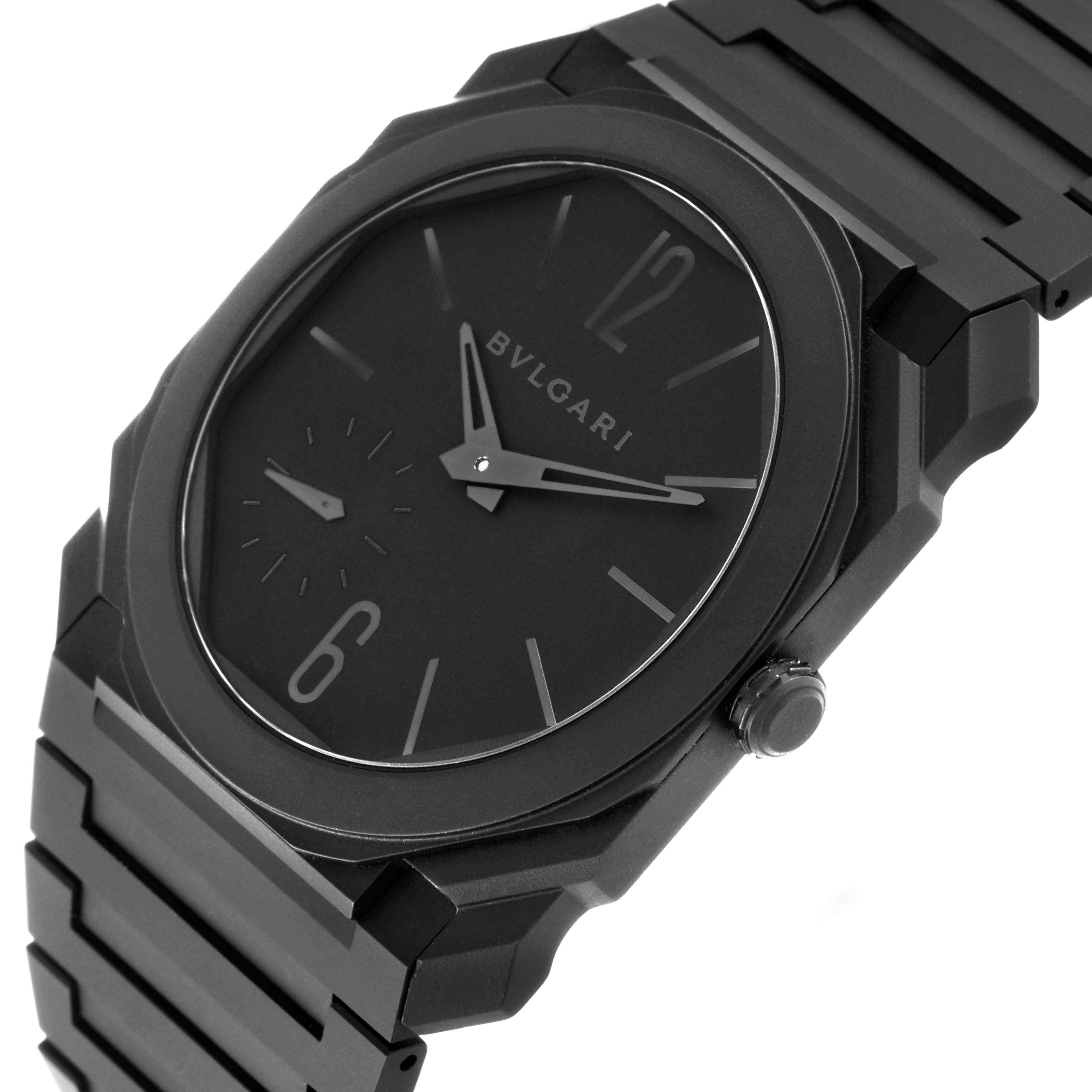 This image shows the face and part of the band of a Bvlgari Octo 103077 Men's Ceramic Black Dial 103077 Men's Ceramic Black Dial watch from a slightly angled view.