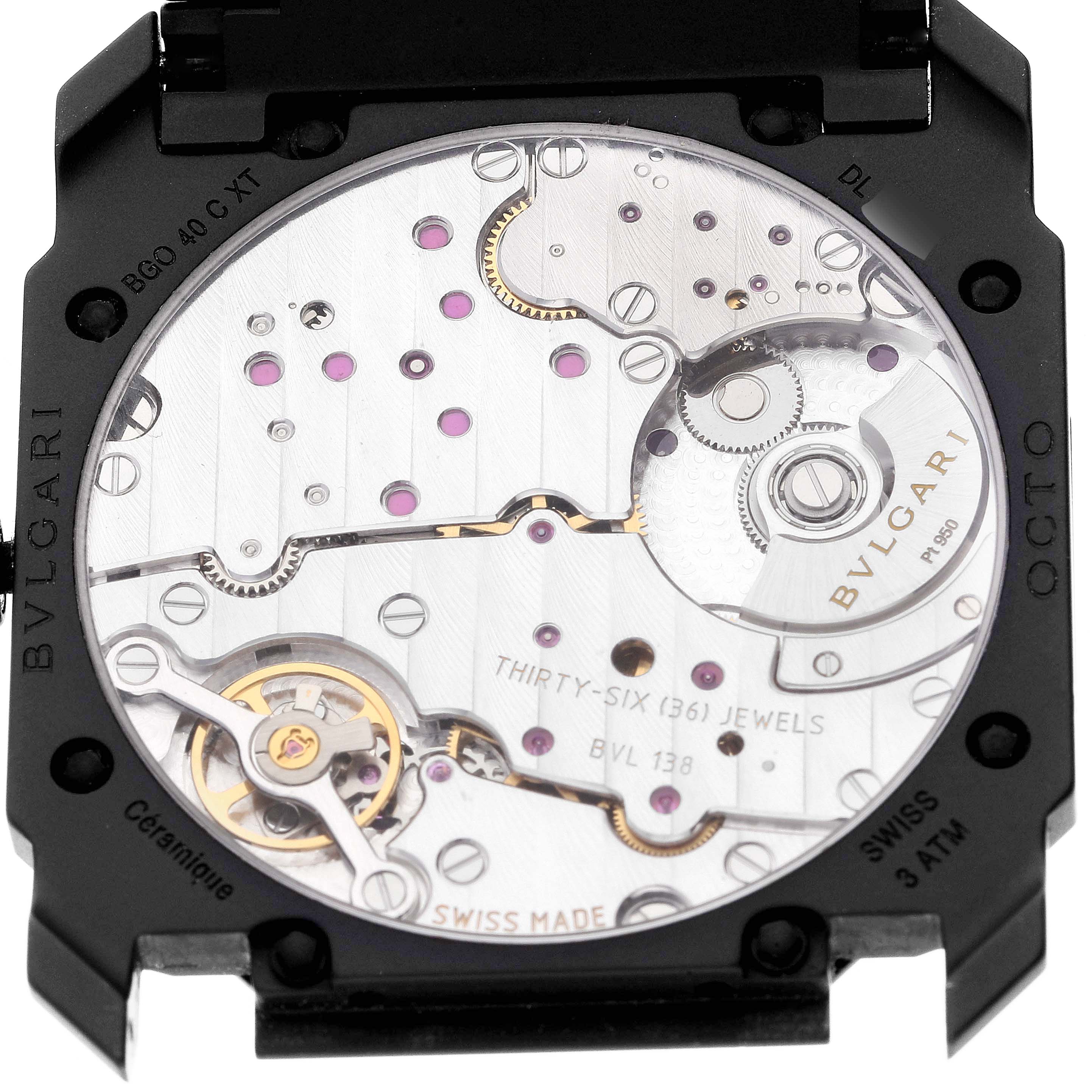 This is a close-up shot of the intricate back mechanism of a Bvlgari Octo 103077 Men's Ceramic Black Dial 103077 Men's Ceramic Black Dial model watch.