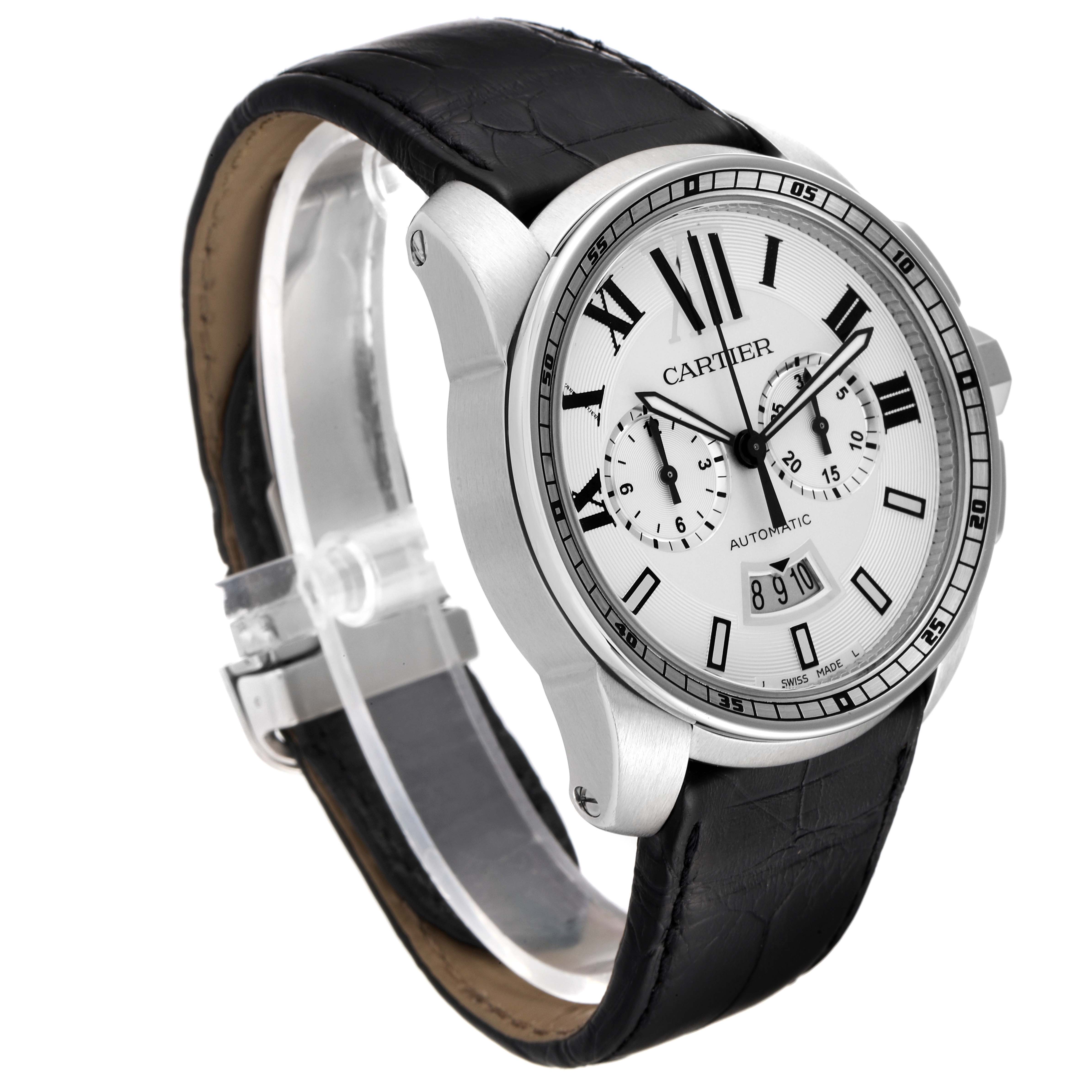 The image shows a Calibre de Cartier watch by Cartier at a slight front-side angle displaying its dial, case, crown, and leather strap.