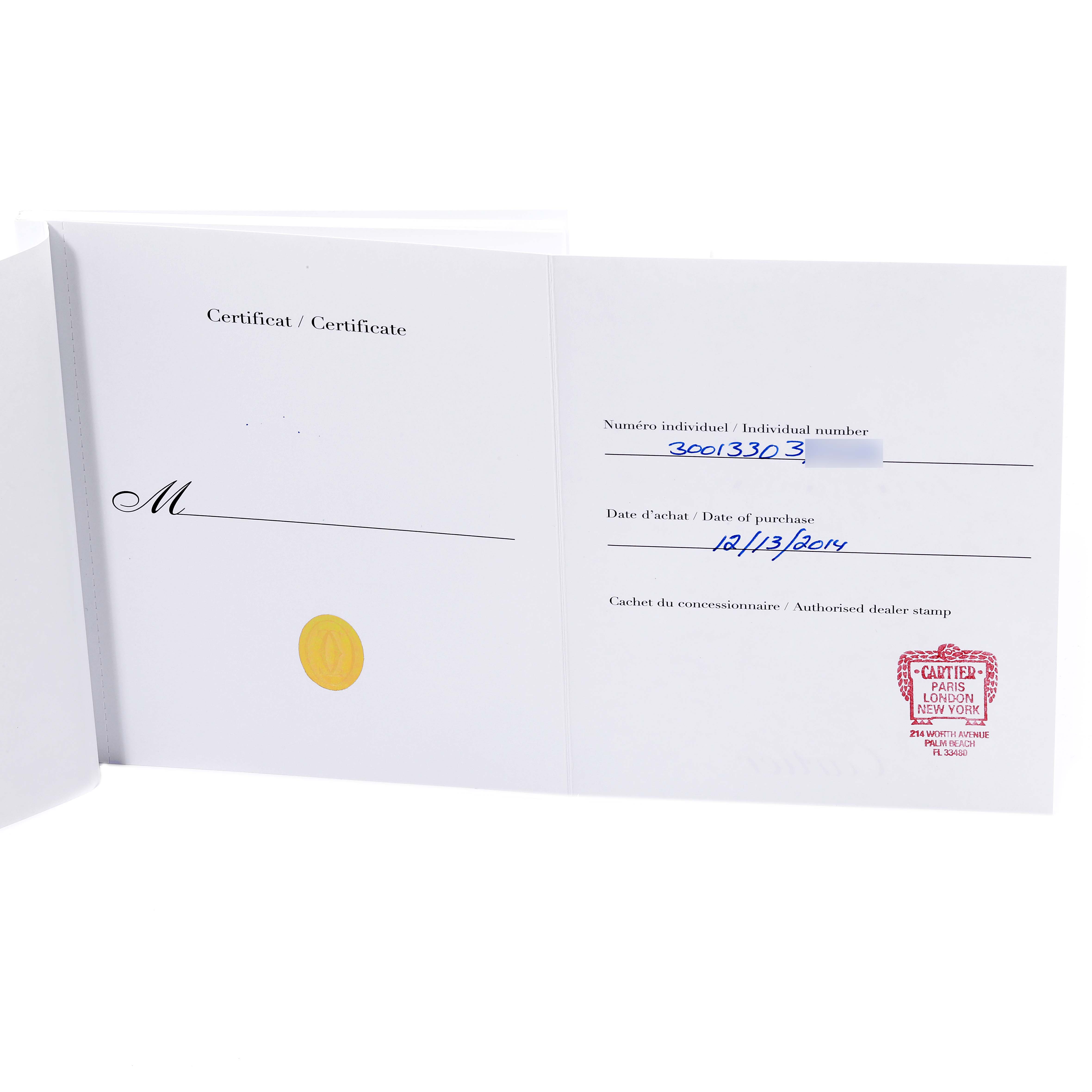 The image shows an open certificate booklet for a Cartier Ballon Bleu W69012Z4 Men's Stainless Steel Silver Dial watch, displaying individual number, purchase date, and a dealer stamp.