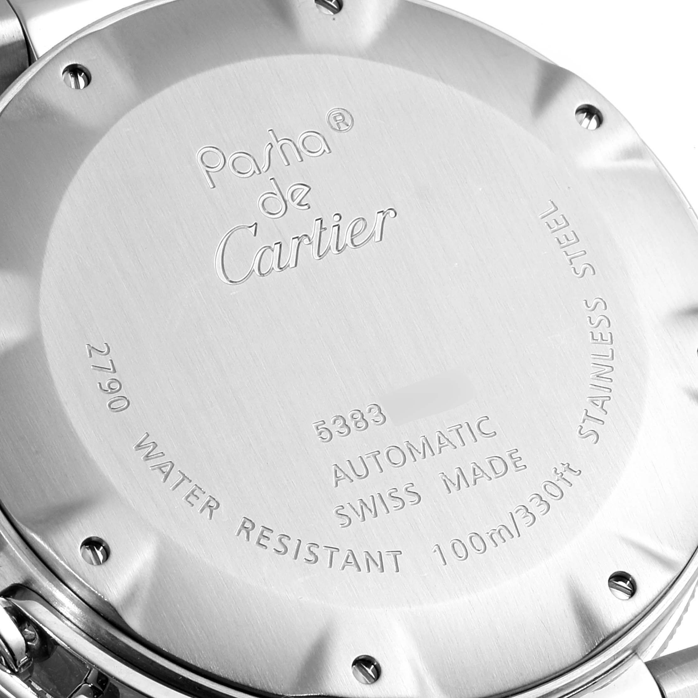 The image shows the back of a Cartier Pasha W31077M7 Men
s Stainless Steel Black Dial W31077M7 Men
s Stainless Steel Black Dial watch, highlighting its engravings and specifications.