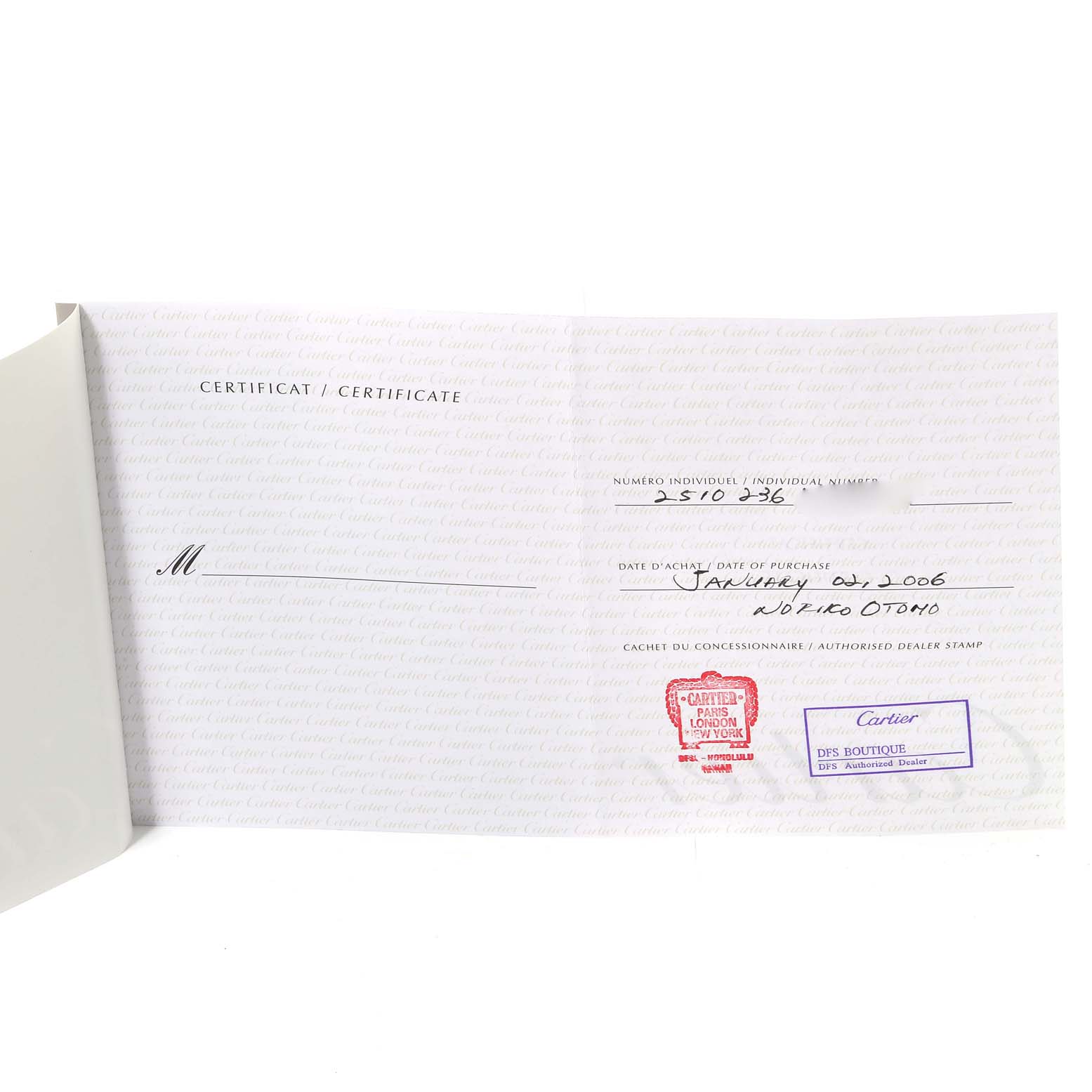 This image shows a certificate of authenticity for the Cartier Roadster W62000V3 Men's Stainless Steel Silver Dial W62000V3 Men's Stainless Steel Silver Dial watch, including the date of purchase and dealer stamps.