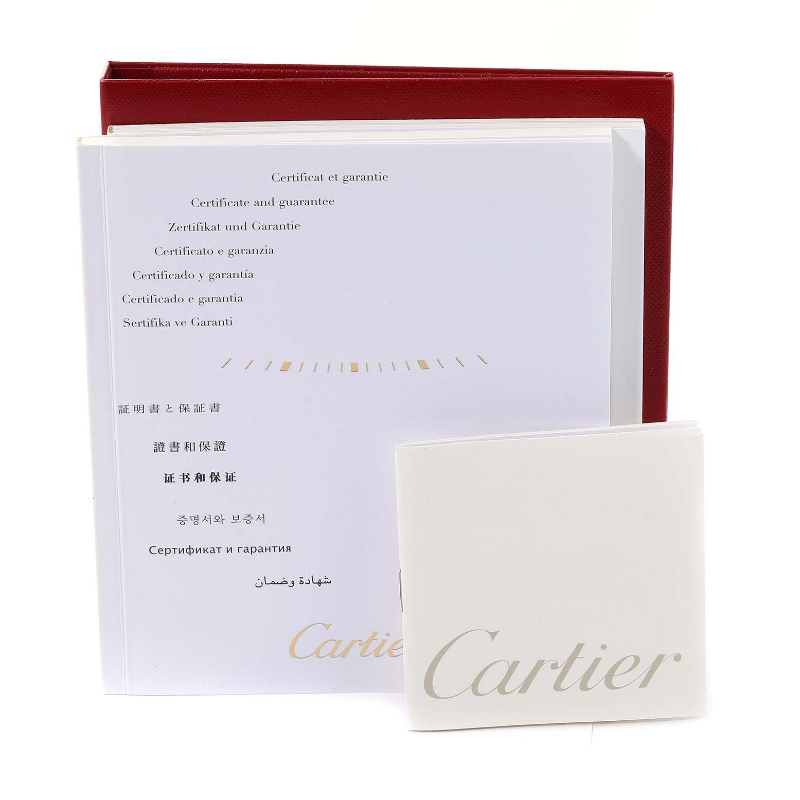 The image shows the warranty booklet and red presentation box for the Cartier Ronde W6701010 Men
s Stainless Steel Silver Dial W6701010 Men
s Stainless Steel Silver Dial model watch.