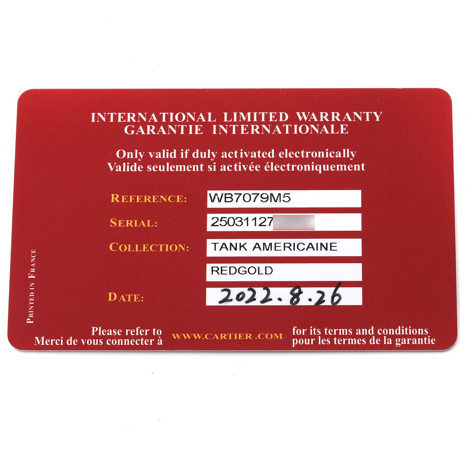 This is a close-up of the warranty card for the Cartier Tank Americaine WB7079M5 Women's Rose Gold Silver Dial WB7079M5 Women's Rose Gold Silver Dial model.