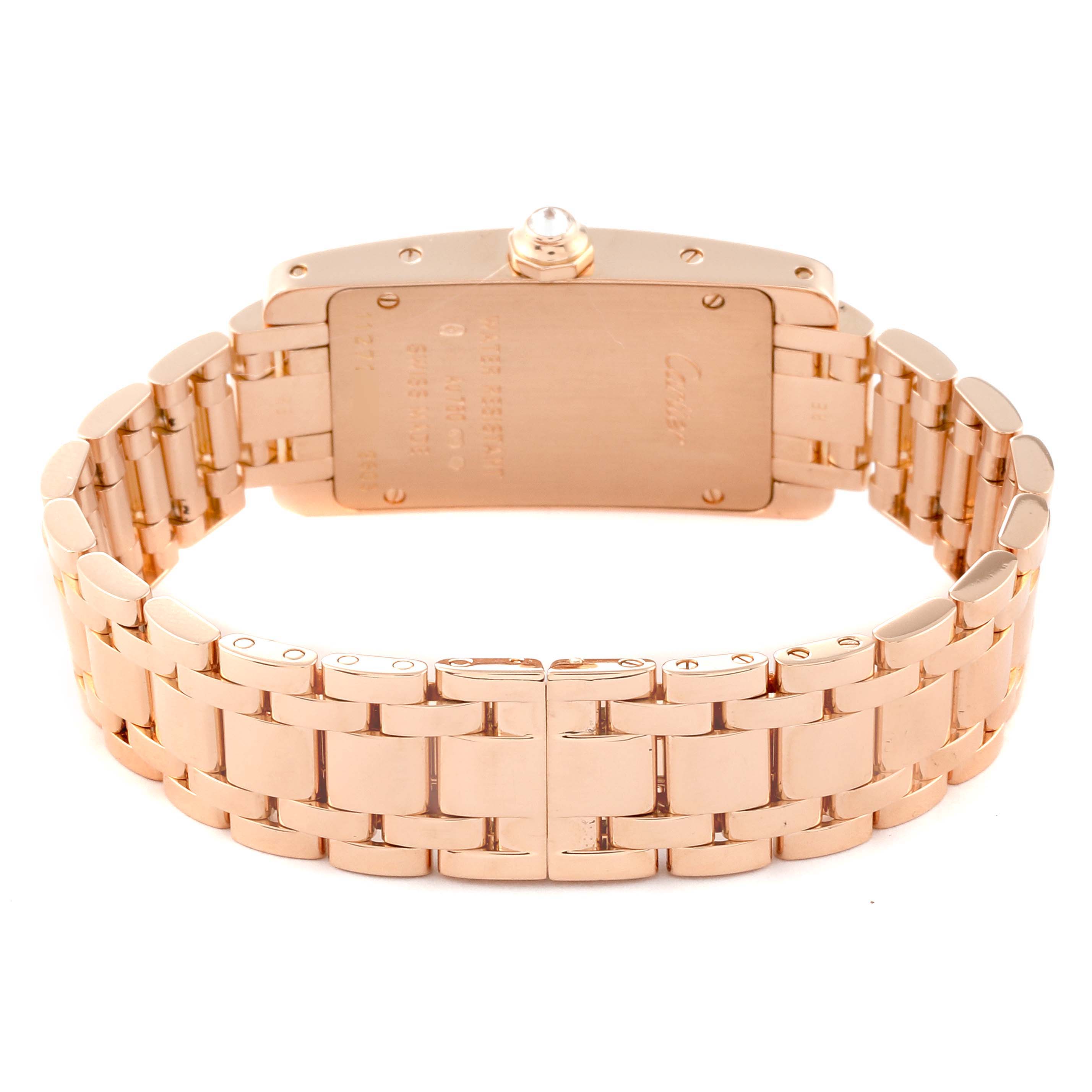 The image shows a rear view of the Tank Americaine watch by Cartier, highlighting its gold bracelet and case back.