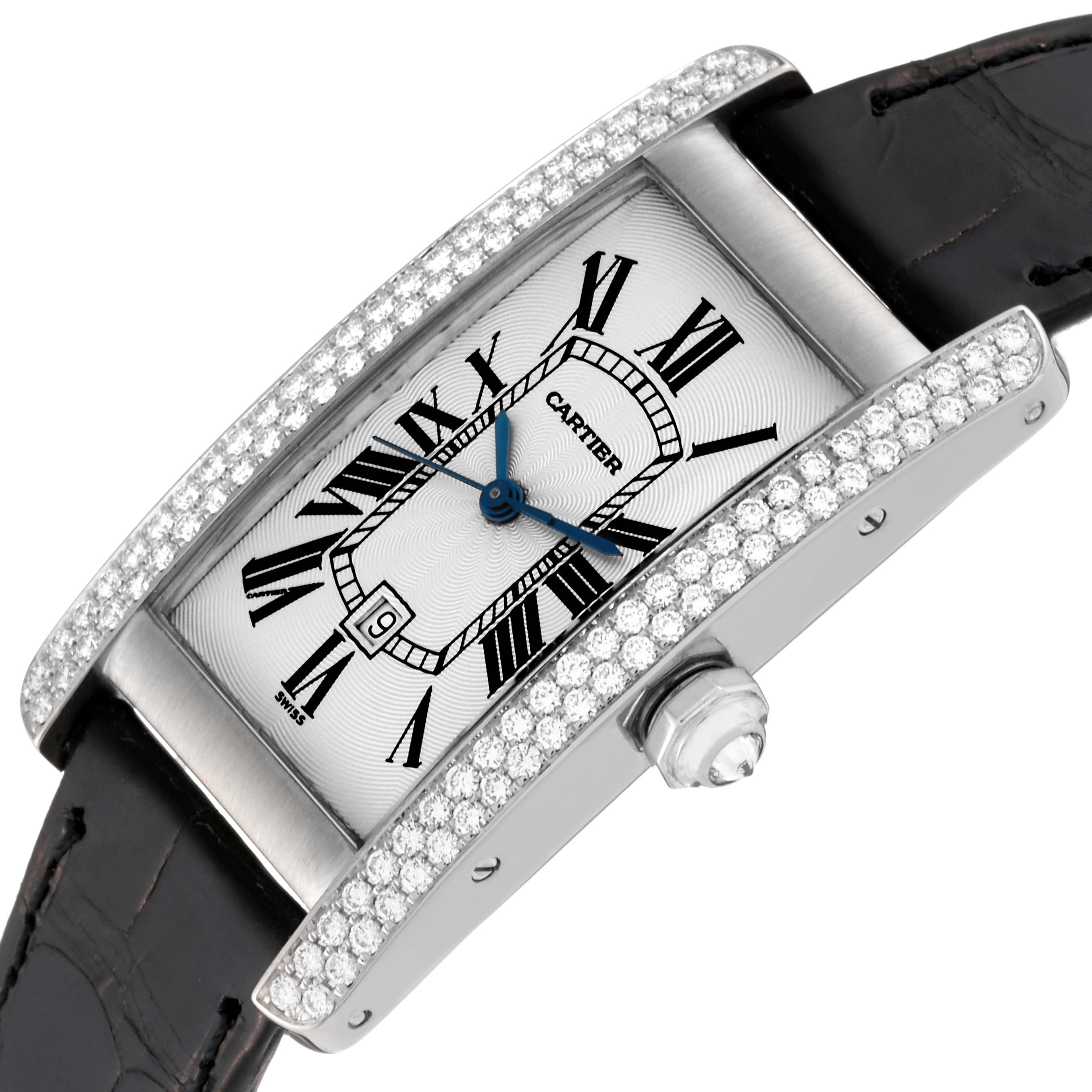 The Cartier Tank Americaine WB702651 Women
s White Gold Silver Dial WB702651 Women
s White Gold Silver Dial watch is shown at an oblique angle, highlighting its diamond bezel, crown, and leather strap.