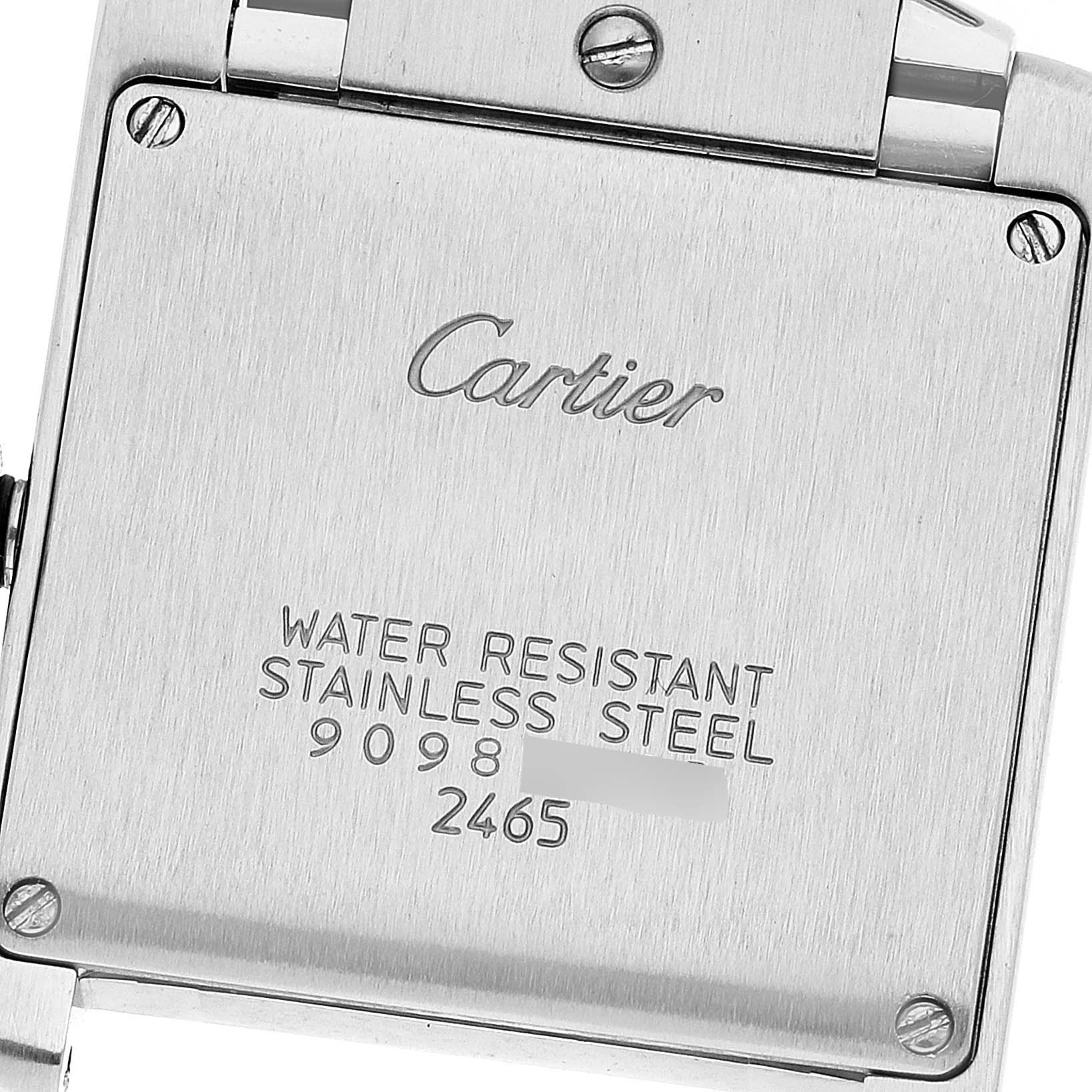 The image shows the back case of a Cartier Tank Française watch, highlighting its stainless steel material and water resistance.