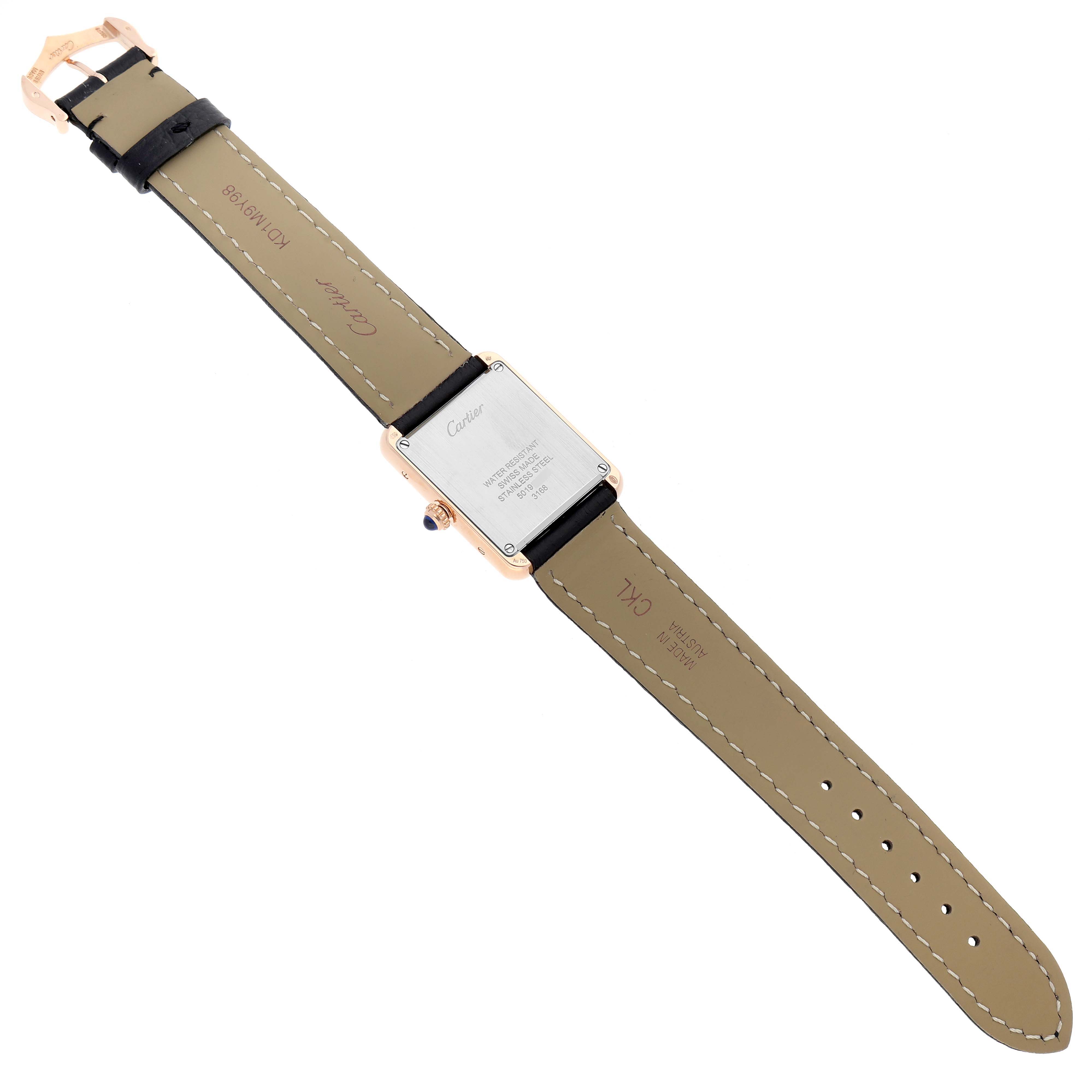 The image shows the back of a Tank Solo watch by Cartier, displaying its case back, strap, and buckle.