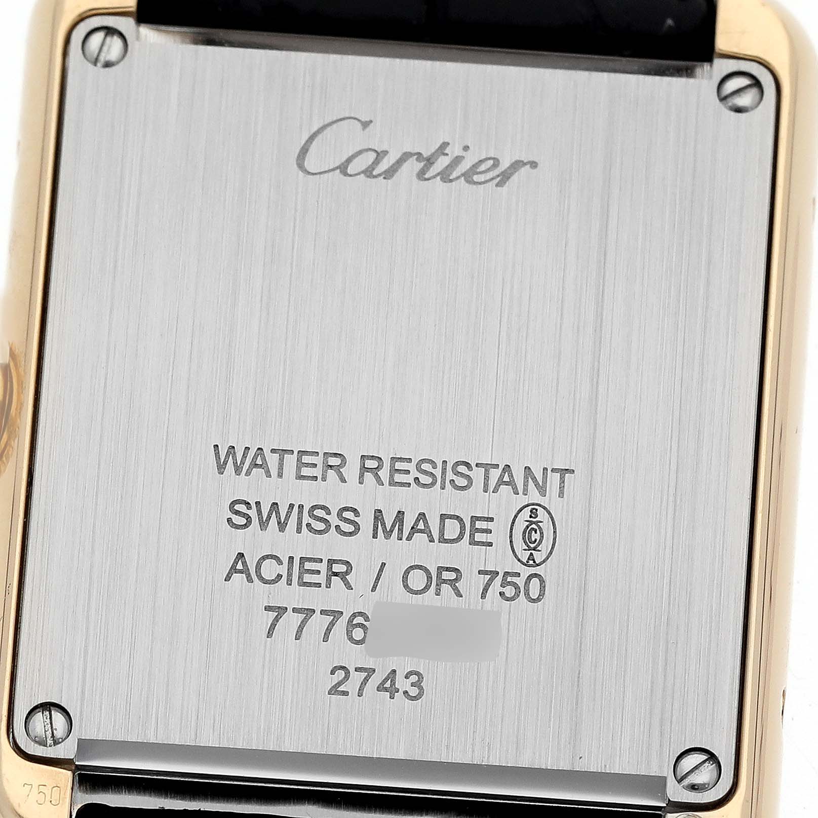 This image shows the back case of a Cartier Tank Solo W1018755 Women
s Steel and Gold (two tone) Silver Dial W1018755 Women
s Steel and Gold (two tone) Silver Dial watch, displaying various specifications.