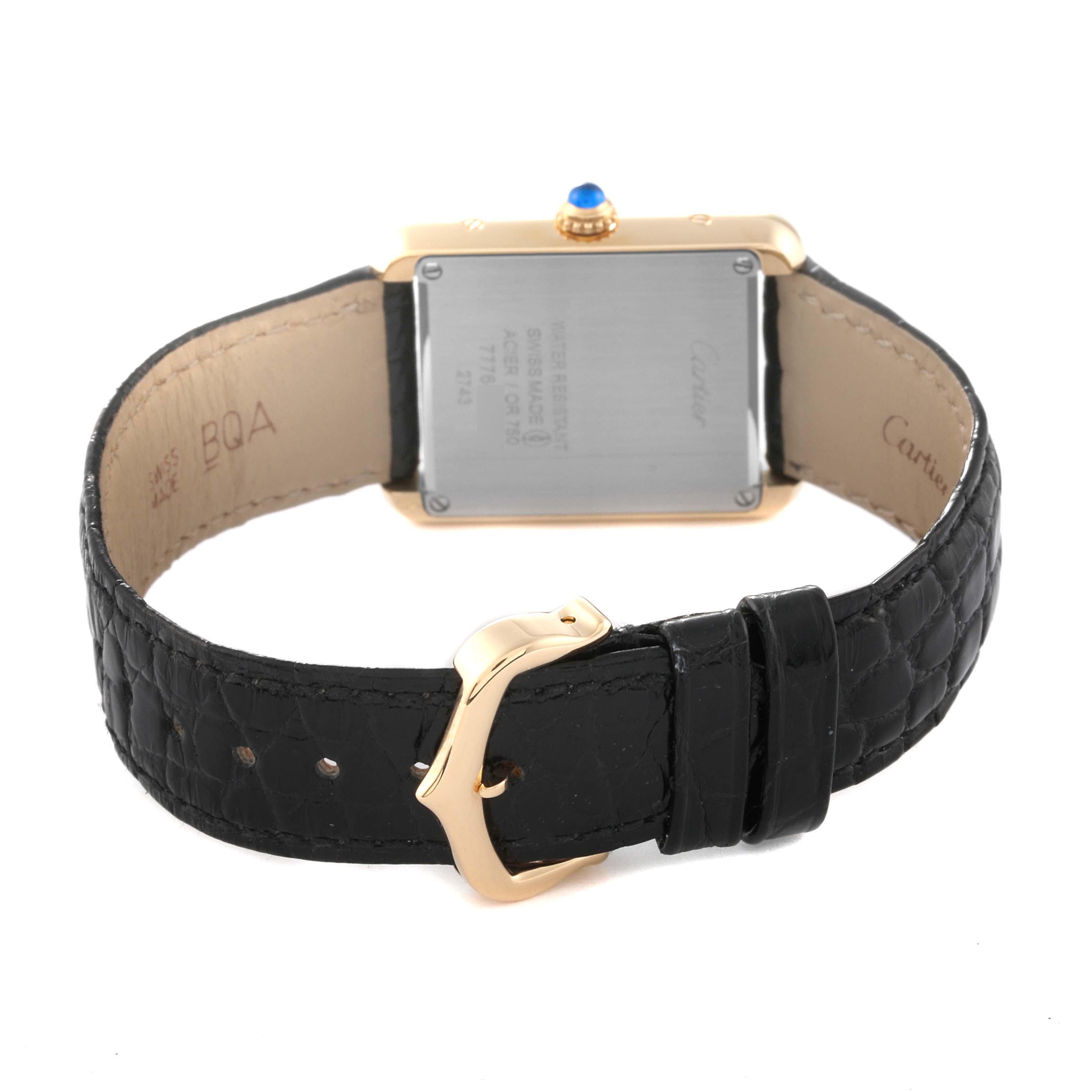 This image shows the back view of a Cartier Tank Solo W1018755 Women
s Steel and Gold (two tone) Silver Dial W1018755 Women
s Steel and Gold (two tone) Silver Dial watch, highlighting the strap and case back details.