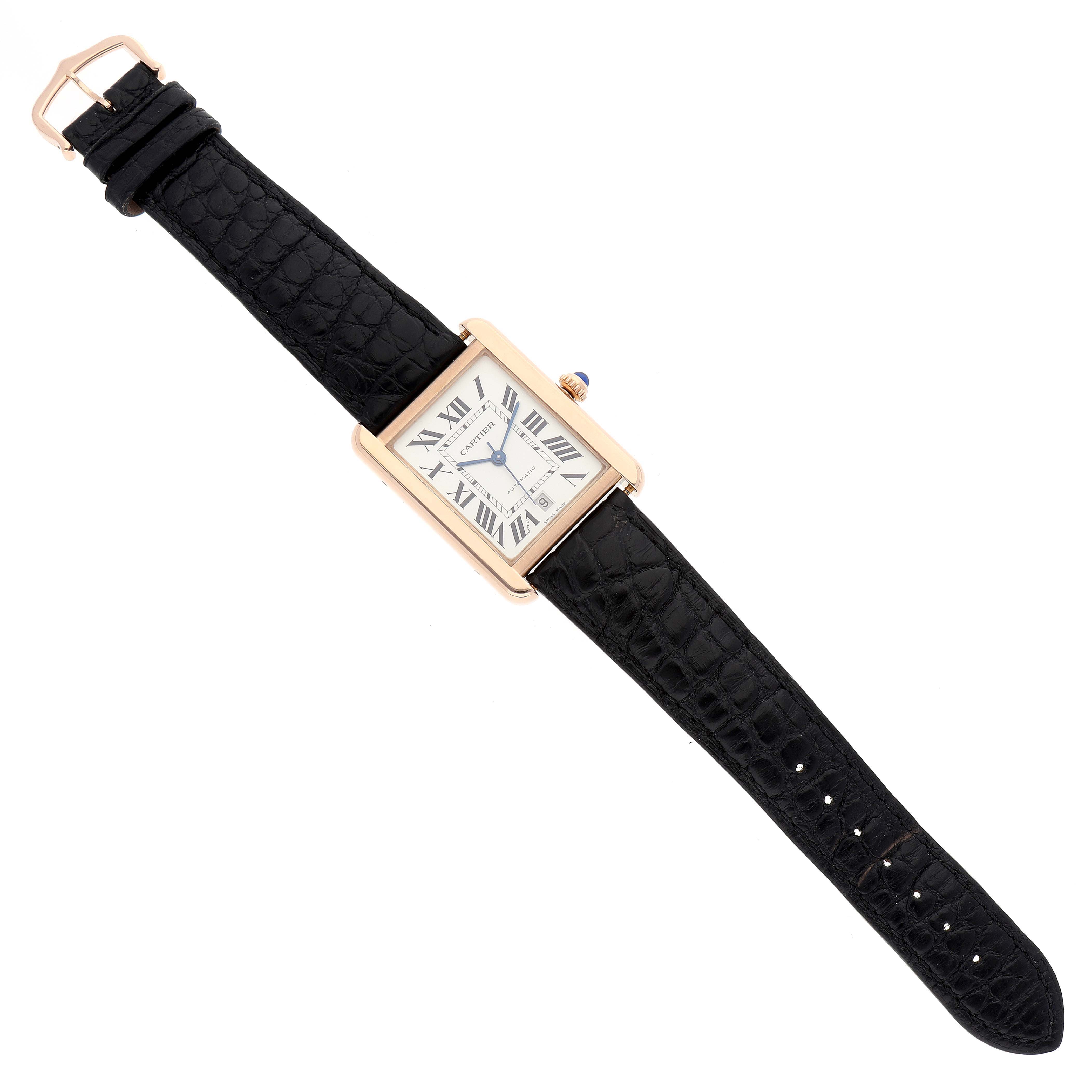 The Cartier Tank Solo W5200026 Men
s Rose Gold Silver Dial W5200026 Men
s Rose Gold Silver Dial watch is shown at a top-down angle, displaying the face, black leather strap, and gold case with a blue cabochon crown.