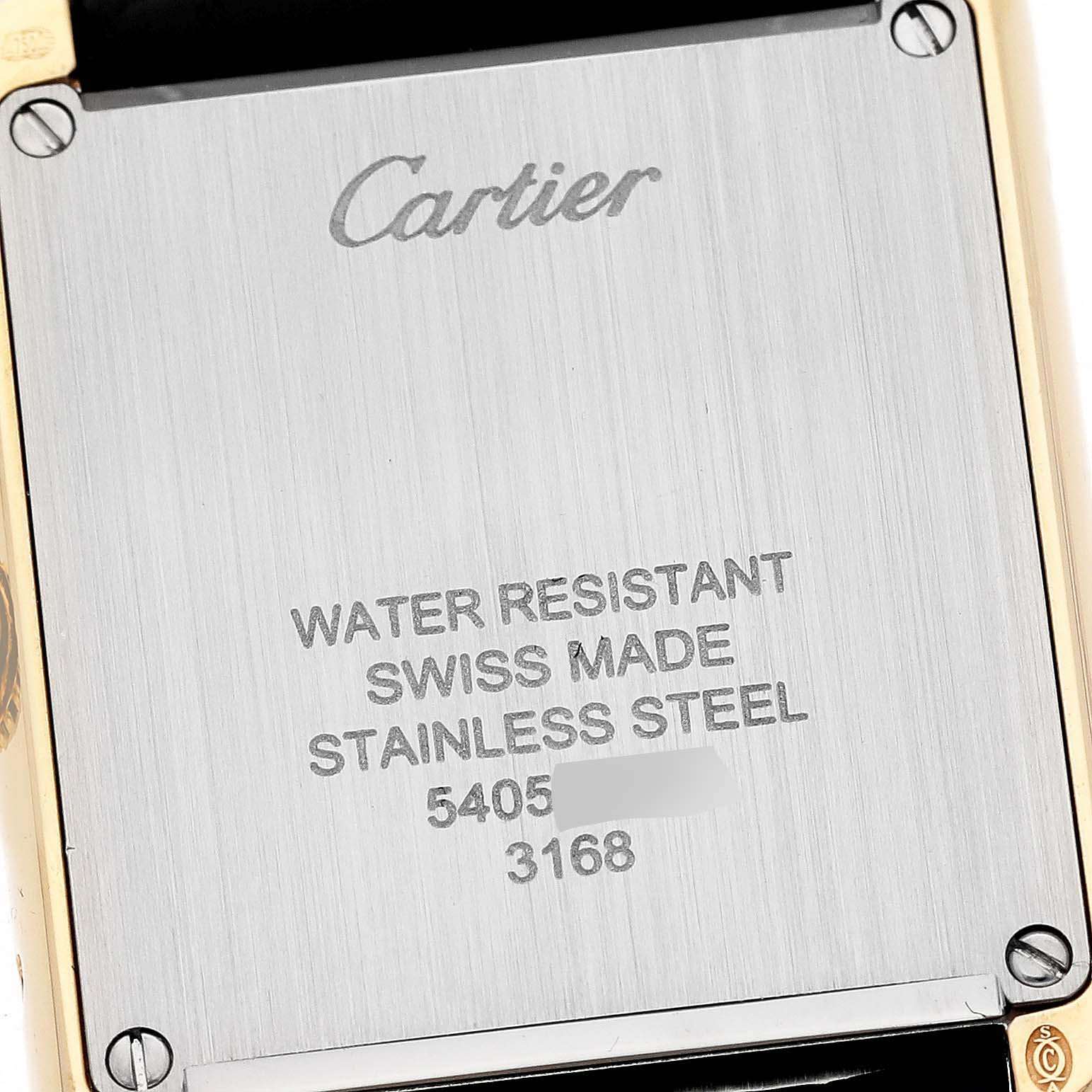 The image shows the back case of a Cartier Tank Solo W5200002 Women
s Steel and Gold (two tone) Silver Dial W5200002 Women
s Steel and Gold (two tone) Silver Dial watch, highlighting the branding, material, and water resistance.