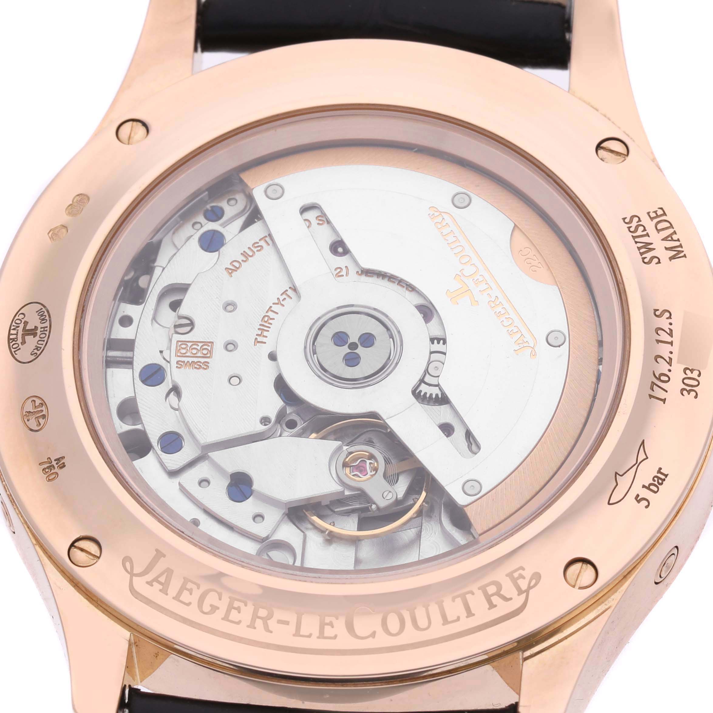 The image shows the back of a Jaeger LeCoultre Master Q1552520 Men's Rose Gold Silver Dial Q1552520 Men's Rose Gold Silver Dial model watch, highlighting the movement and clear case back.