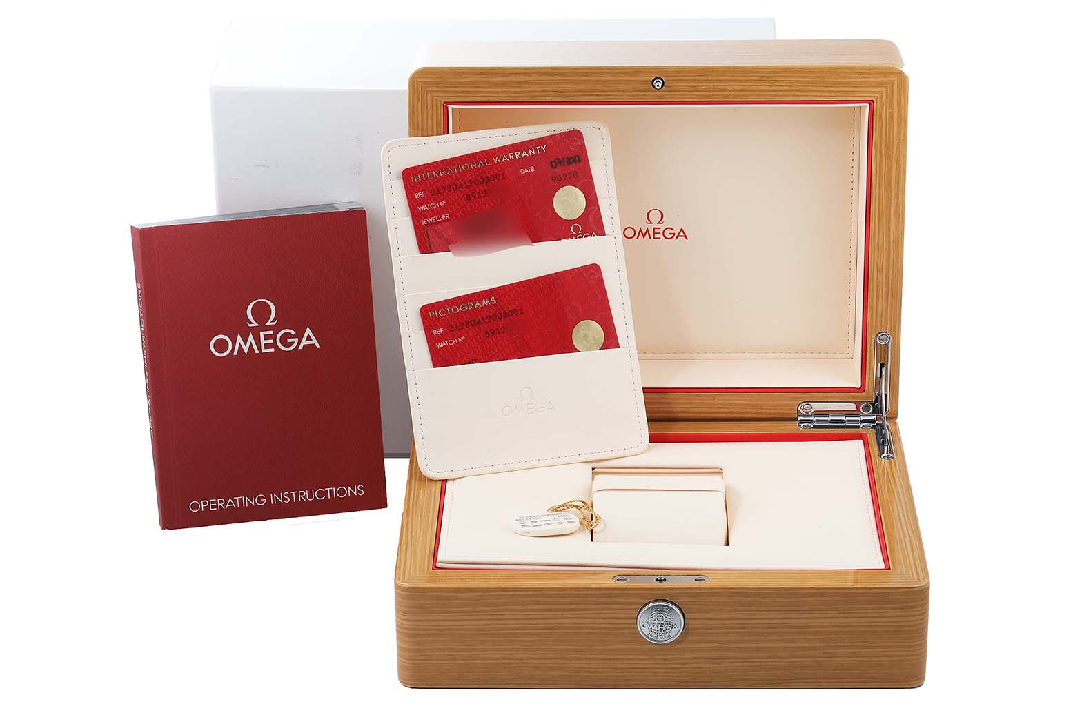 The image shows the packaging, warranty cards, and an operating manual for the Omega Seamaster 212.30.41.20.03.001 Men's Stainless Steel Blue Dial 212.30.41.20.03.001 Men's Stainless Steel Blue Dial model.
