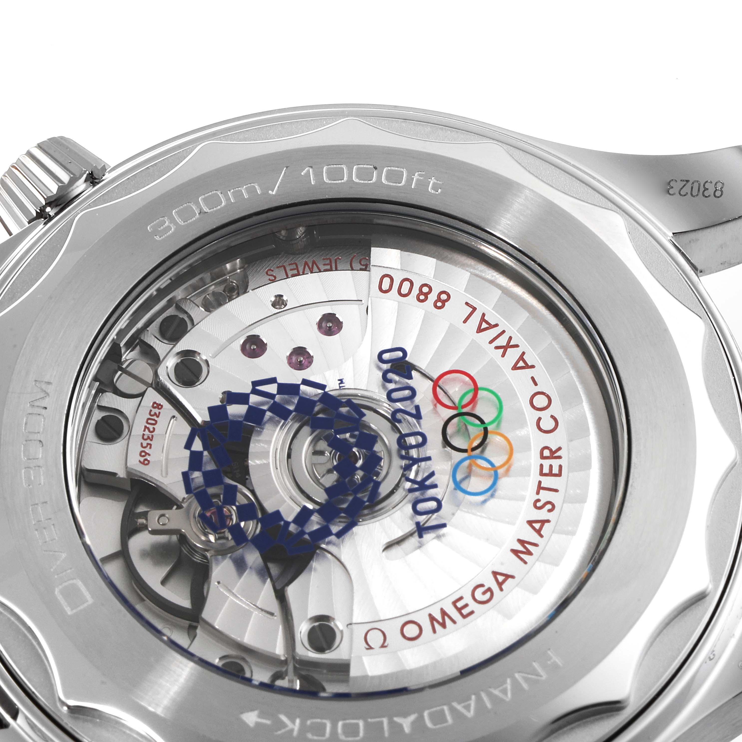 This image shows the backside of the Omega Seamaster 522.30.42.20.04.001 Men's Stainless Steel White Dial 522.30.42.20.04.001 Men's Stainless Steel White Dial watch, revealing the movement mechanism and various engravings and markings.