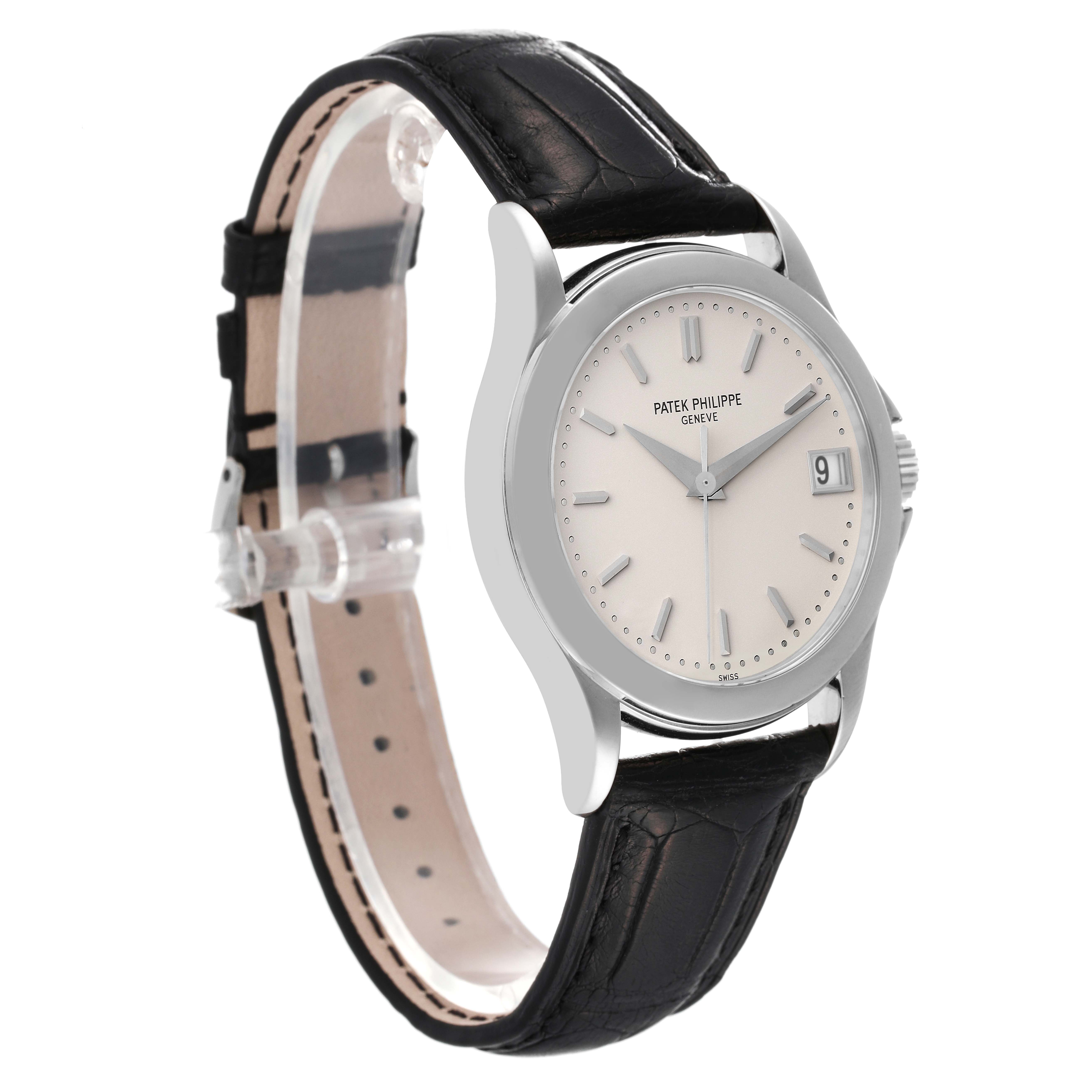 The Patek Philippe Calatrava 5107G Men's White Gold Silver Dial 5107G Men's White Gold Silver Dial watch is shown at a three-quarter angle, highlighting the face, bezel, case, and part of the leather strap.