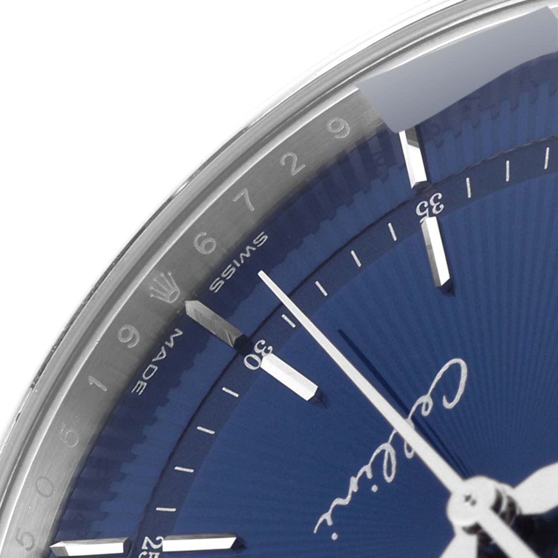 This image shows the dial and minute hand of a Rolex Cellini 50519 Men
s White Gold Blue Dial 50519 Men
s White Gold Blue Dial model watch from a close-up angle.