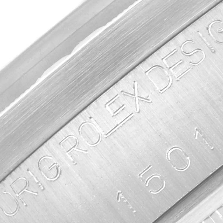 The image shows an angled close-up of the engraved side of the Rolex Vintage Collection 1501 Men's Stainless Steel Black Dial 1501 Men's Stainless Steel Black Dial watch case.
