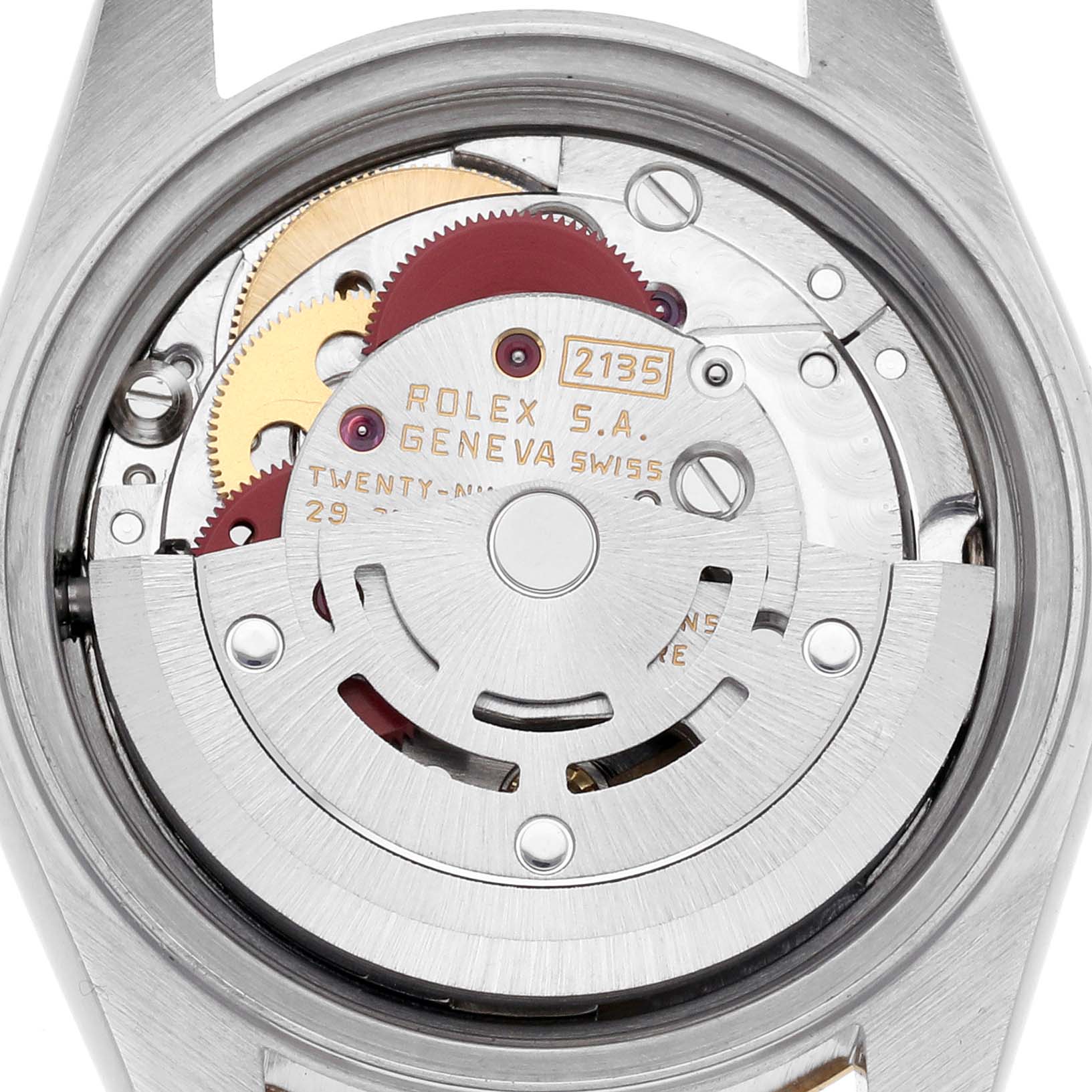 The image shows the movement of a Rolex Date 69173 Women's Steel and Gold (two tone) Black Dial 69173 Women's Steel and Gold (two tone) Black Dial model, highlighting its internal components from a back angle.