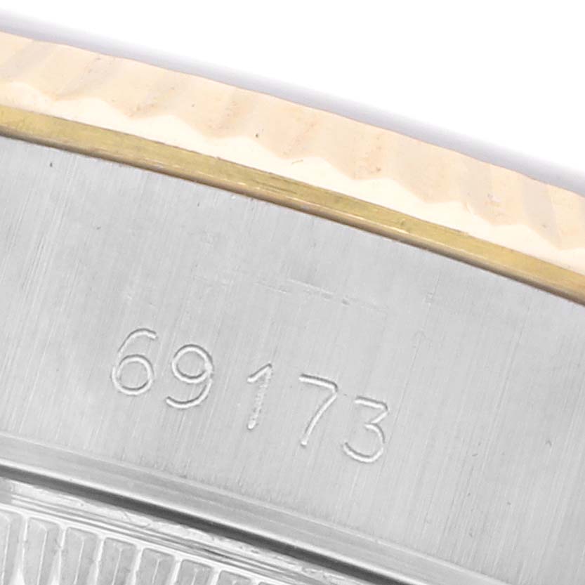 The image shows a close-up of the bezel and case edge, with the reference number "69173" visible on the Rolex Date 69173 Women's Steel and Gold (two tone) Black Dial 69173 Women's Steel and Gold (two tone) Black Dial model.