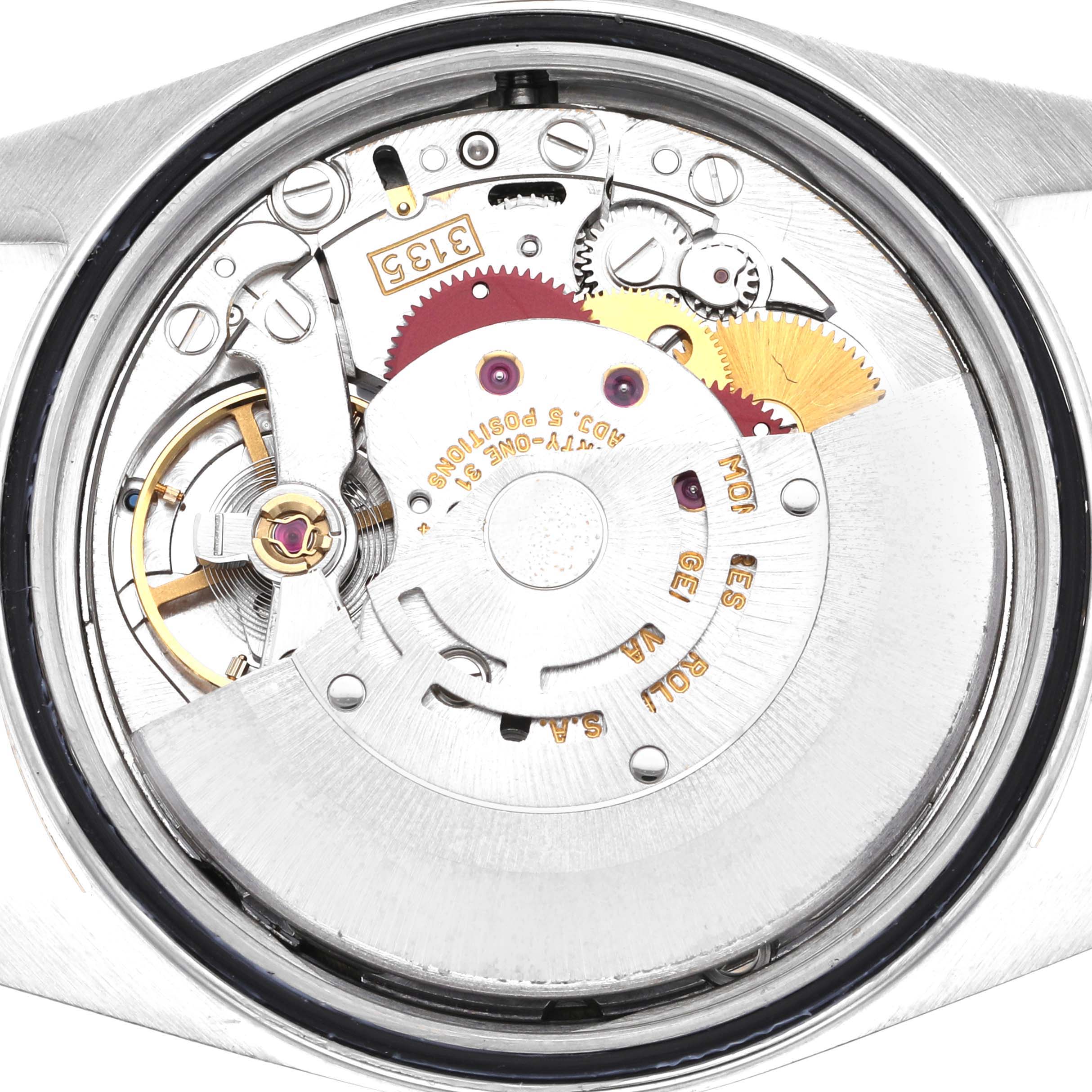 This image shows an internal view of the Rolex Datejust 16233 Men's Steel and Gold (two tone) Champagne Dial 16233 Men's Steel and Gold (two tone) Champagne Dial watch movement, showcasing its mechanical components.