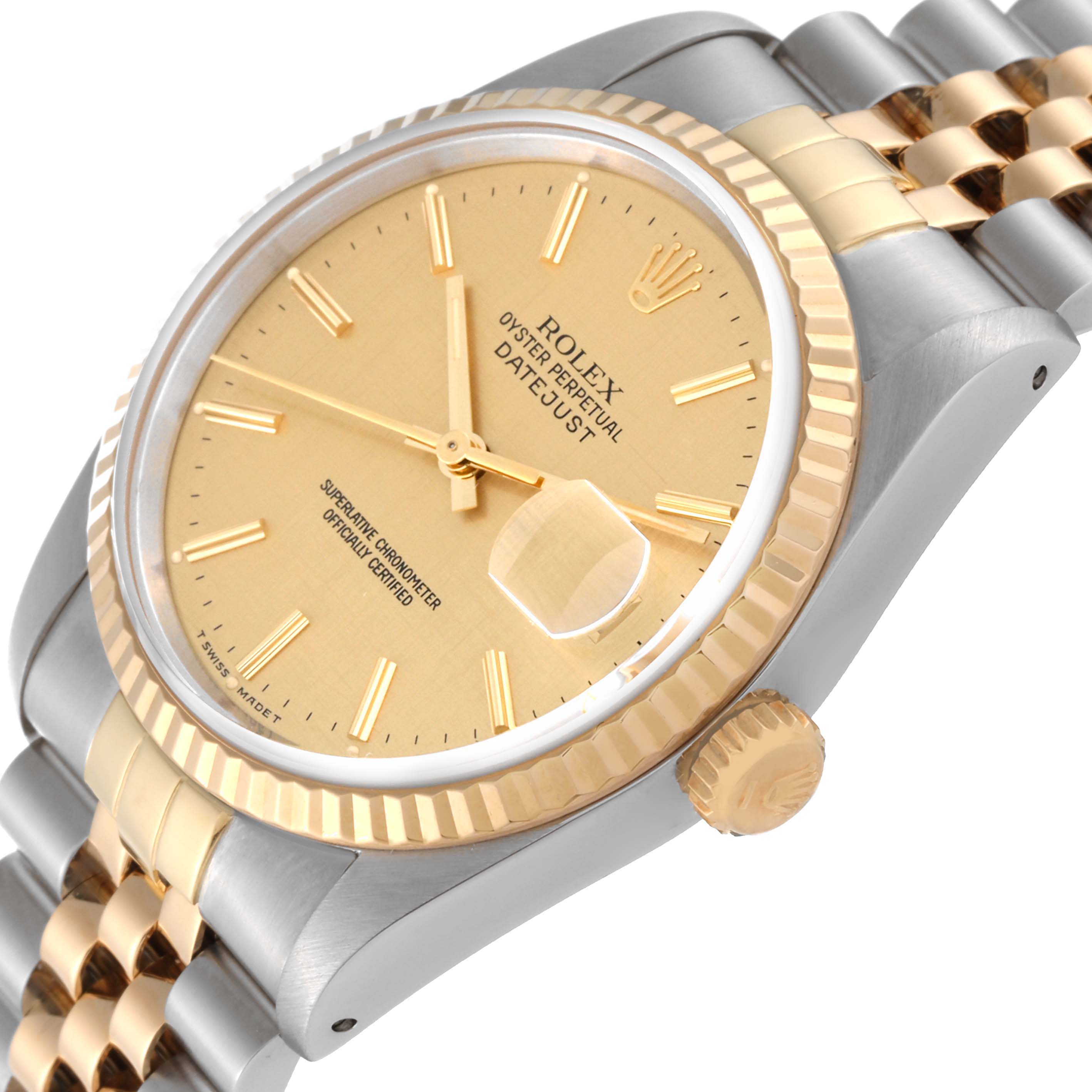 This image shows a close-up angle of the Rolex Datejust 16233 Men's Steel and Gold (two tone) Champagne Dial 16233 Men's Steel and Gold (two tone) Champagne Dial watch, focusing on the dial, bezel, and bracelet.