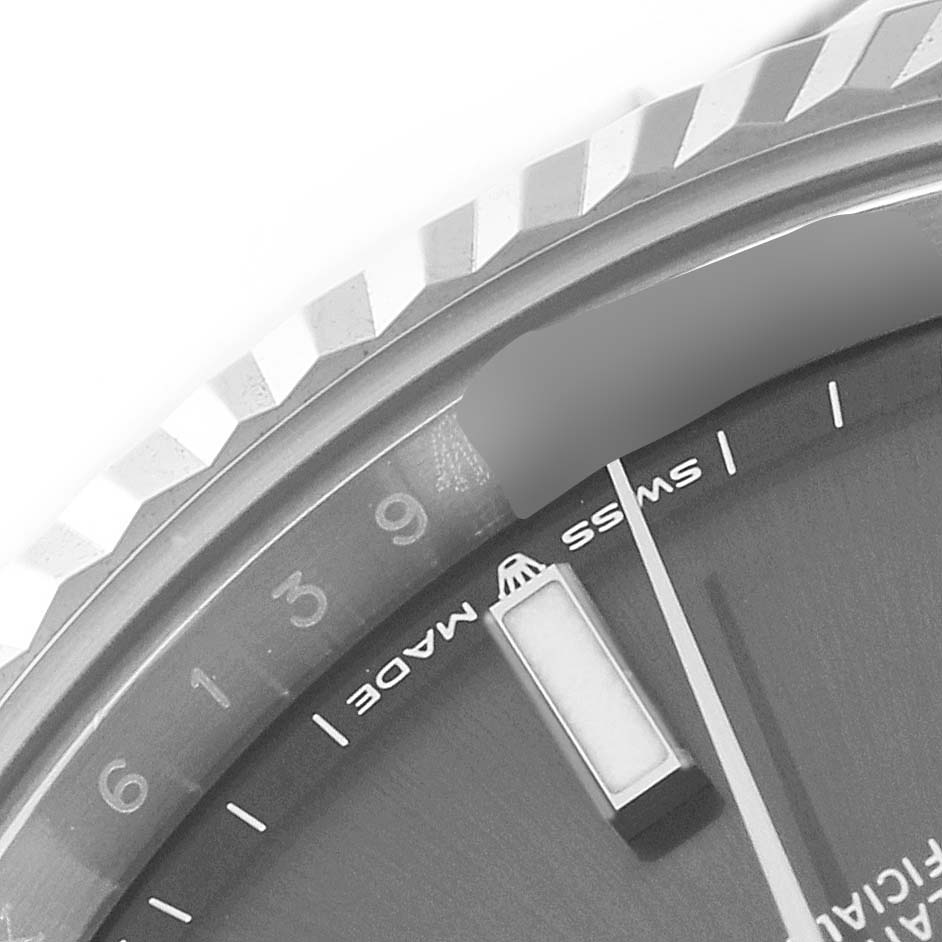 The image shows a close-up of the bezel and dial of a Rolex Datejust 41 126334 Men's Stainless Steel Grey Dial, highlighting the markers and "Swiss Made" text.