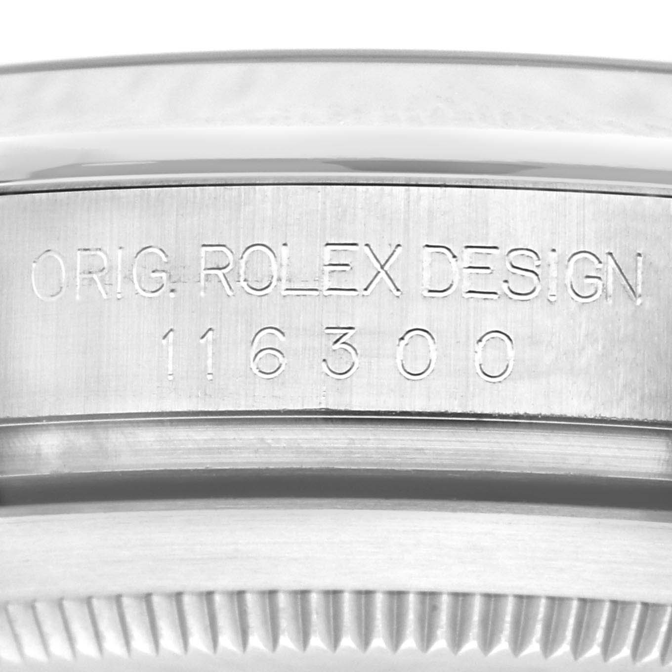 This close-up image shows the engraved case back of a Rolex Datejust 41 116300 Men
s Stainless Steel Blue Dial 116300 Men
s Stainless Steel Blue Dial model, displaying "ORIG. ROLEX DESIGN" and the reference number.