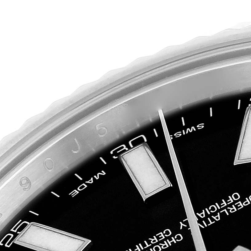 The image shows a close-up of the dial, markers, and part of the bezel of a Rolex Datejust 41 116334 Men
s Stainless Steel Black Dial 116334 Men
s Stainless Steel Black Dial watch.