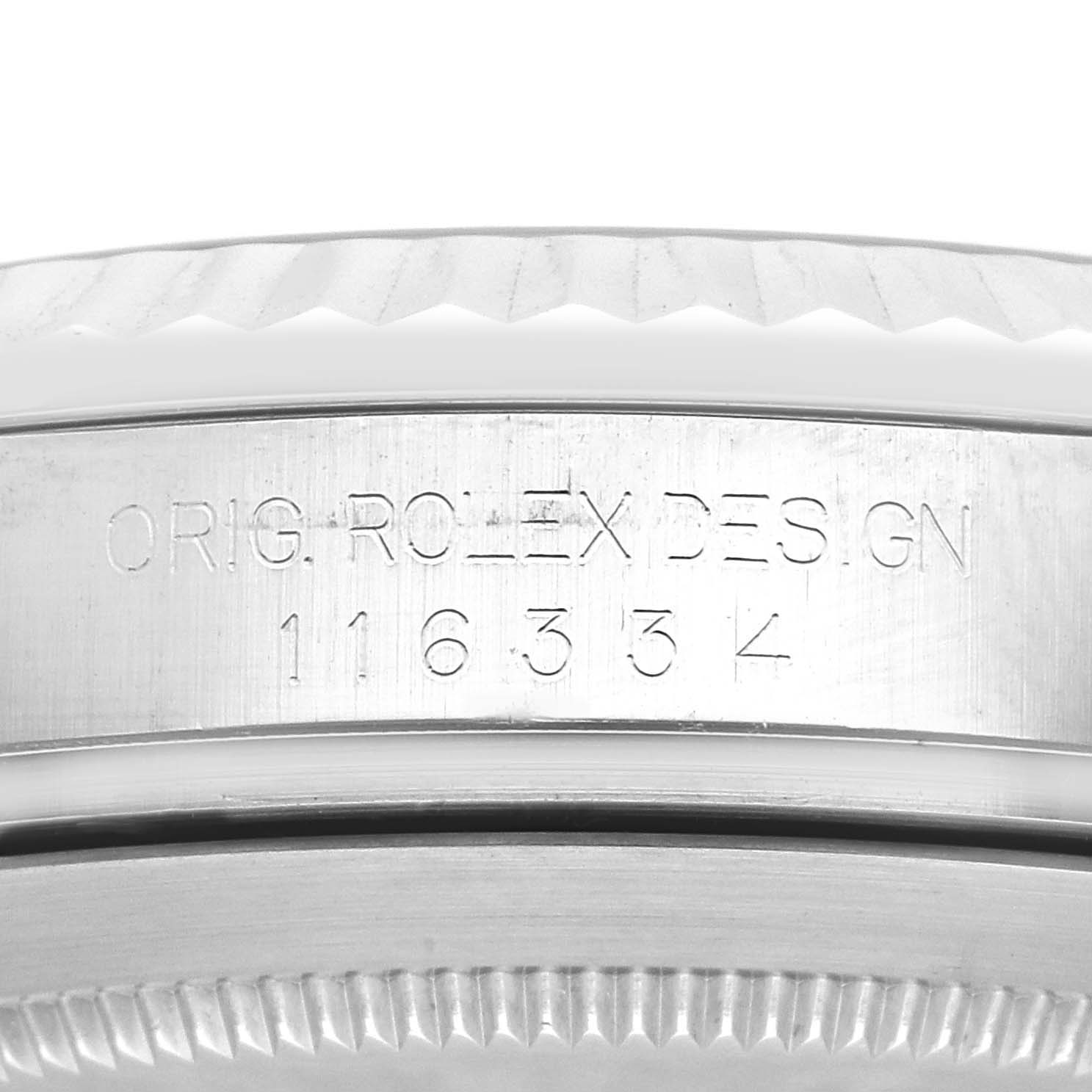 The image shows a close-up of the case side of the Rolex Datejust 41 116334 Men
s Stainless Steel Black Dial 116334 Men
s Stainless Steel Black Dial watch, focusing on the engraved model number and "Original Rolex Design" text.