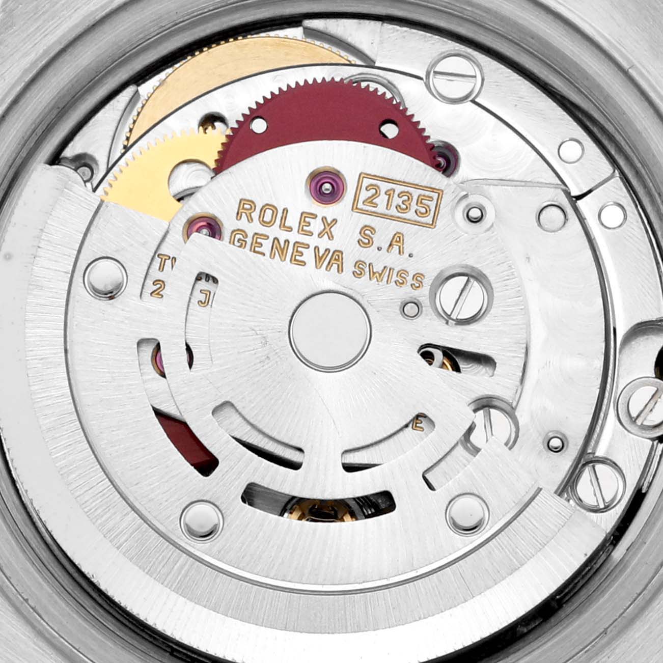 This image shows a close-up of the movement inside a Rolex Datejust 69173 Women's Steel and Gold (two tone) Mother of Pearl Dial 69173 Women's Steel and Gold (two tone) Mother of Pearl Dial watch, specifically the mechanism and gears.