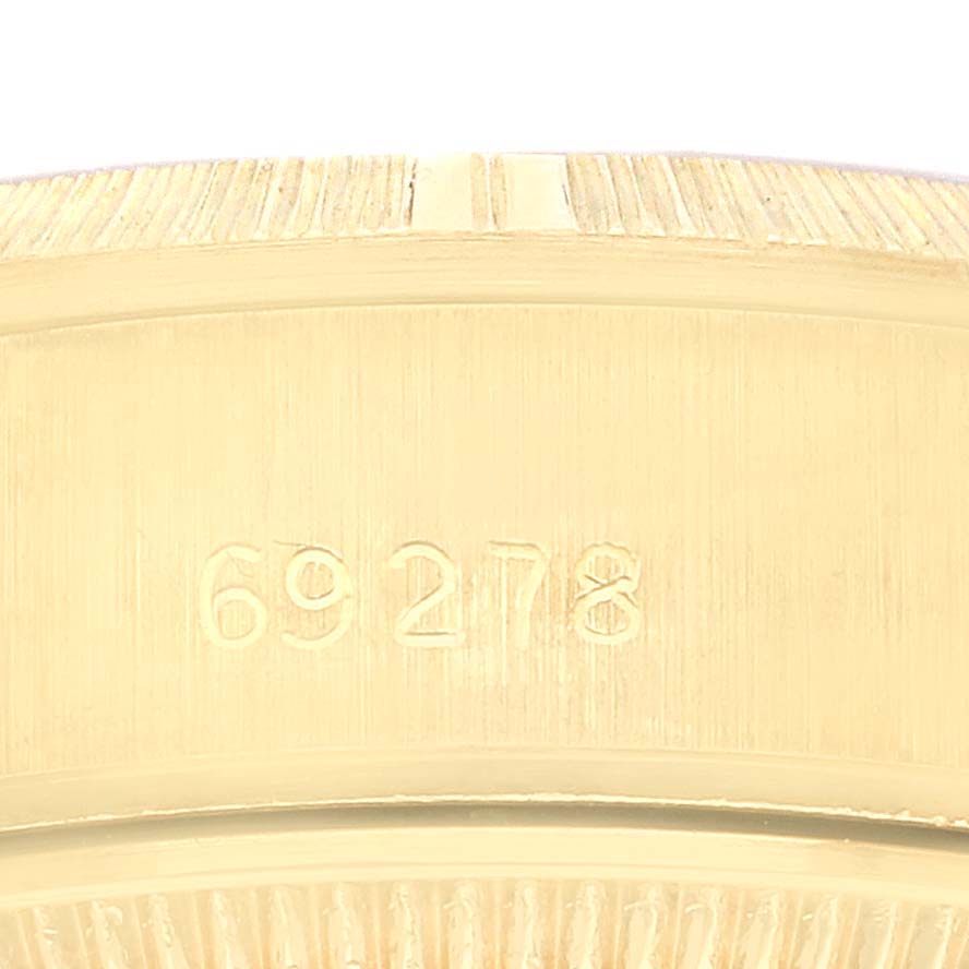 This image shows a close-up of the model number "69278" on a gold Rolex President 69278 Women
s Yellow Gold Champagne Dial 69278 Women
s Yellow Gold Champagne Dial watch case.