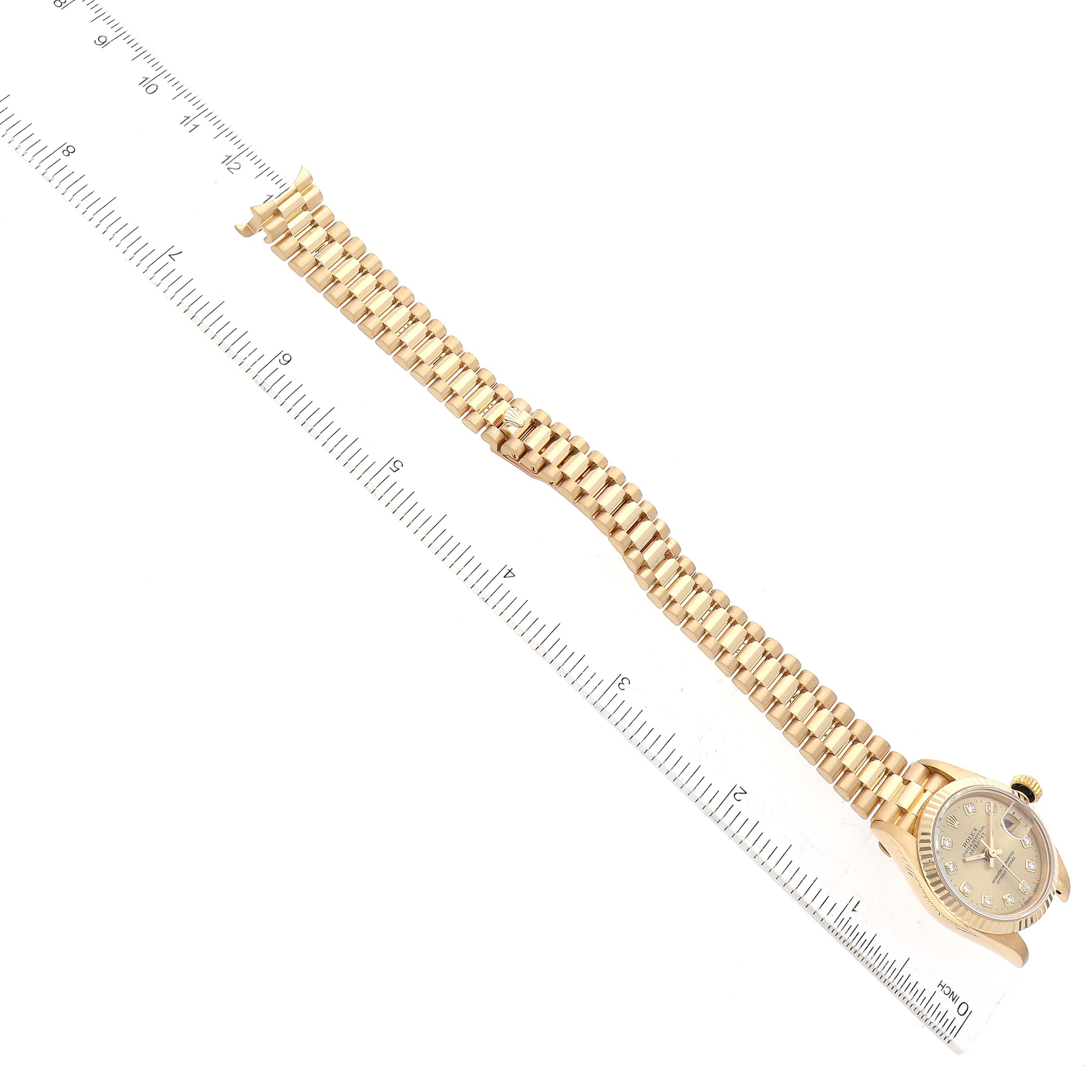 The image shows a side view of a Rolex President 69178 Women
s Yellow Gold Champagne Dial 69178 Women
s Yellow Gold Champagne Dial model watch, highlighting the band and part of the clasp.