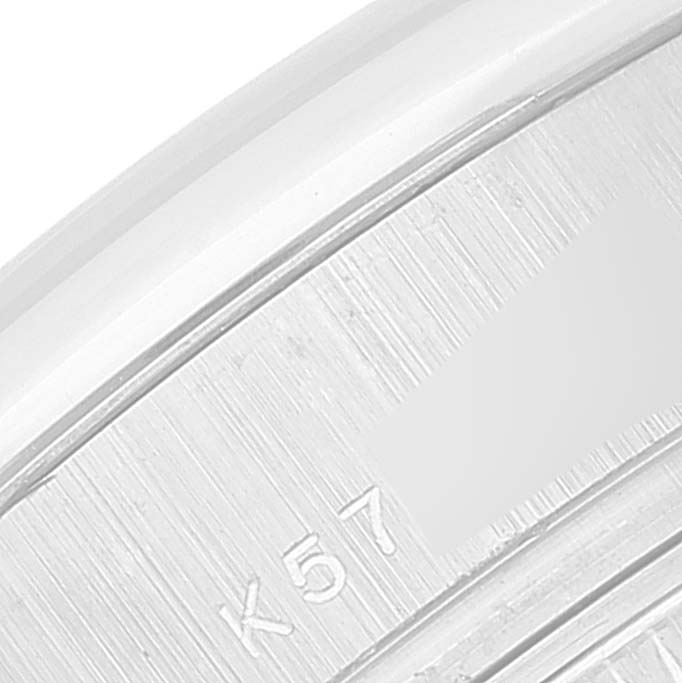 This close-up image of a Rolex President 179166 Women's Platinum Silver Dial 179166 Women's Platinum Silver Dial watch shows the engraved model details on the inner case.