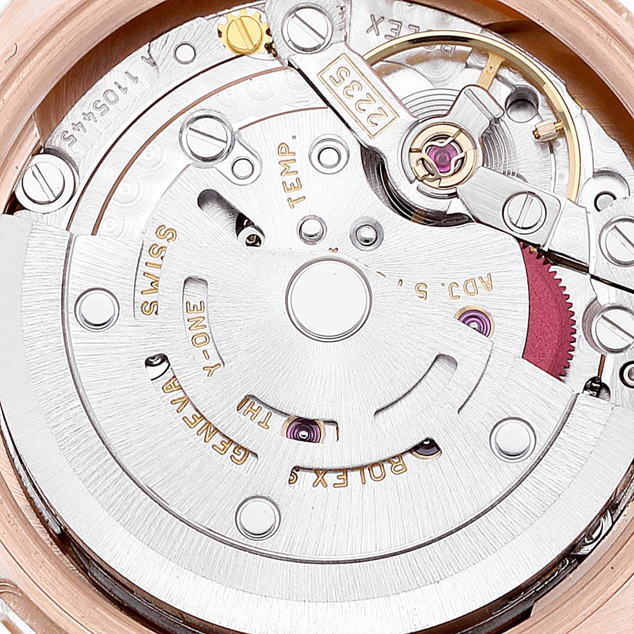 This image shows a detailed view of the intricate inner mechanics of the Rolex President 179165 Women's Rose Gold White Dial 179165 Women's Rose Gold White Dial model watch, revealing the movement parts.