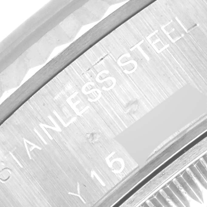 This image shows a close-up of the side engraving indicating "STAINLESS STEEL" on a Rolex Datejust 79174 Women's Stainless Steel Pink Dial 79174 Women's Stainless Steel Pink Dial watch.