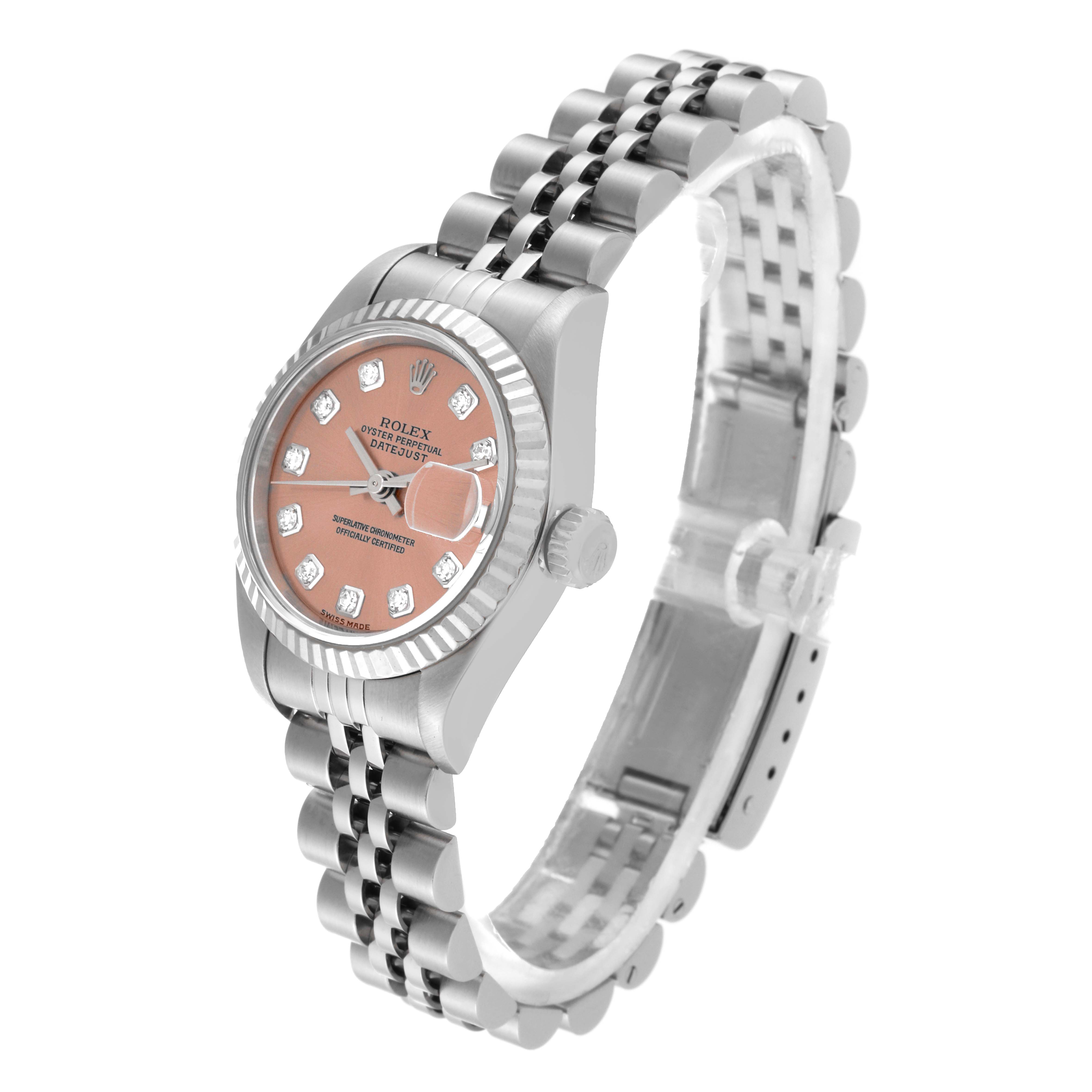 This image shows a Rolex Datejust 79174 Women's Stainless Steel Pink Dial 79174 Women's Stainless Steel Pink Dial watch at an angle displaying the face, crown, and bracelet.