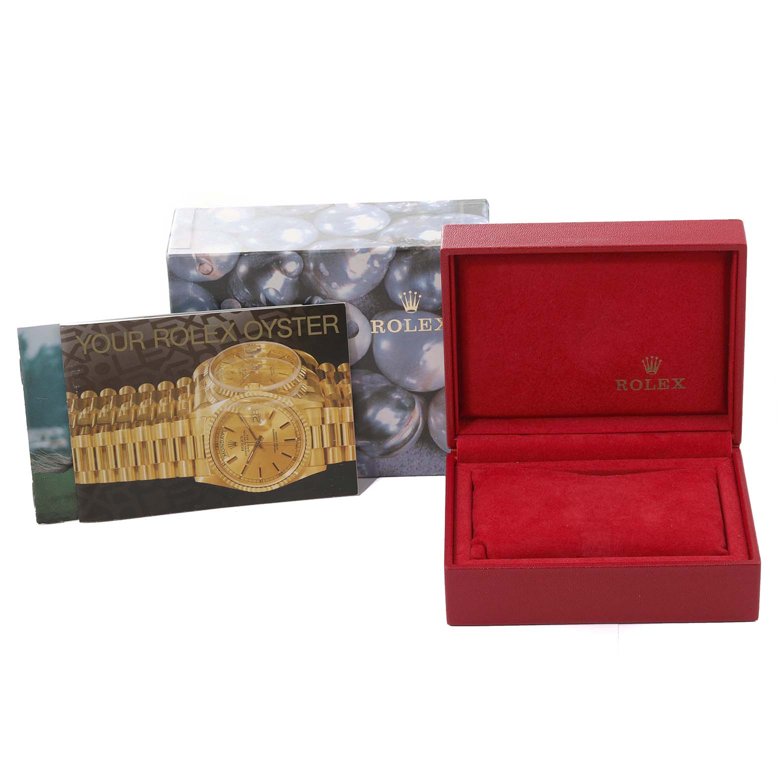 This image displays the box and booklet of a Rolex Datejust 79174 Women's Stainless Steel Pink Dial 79174 Women's Stainless Steel Pink Dial watch, showing packaging and documentation from a frontal angle.