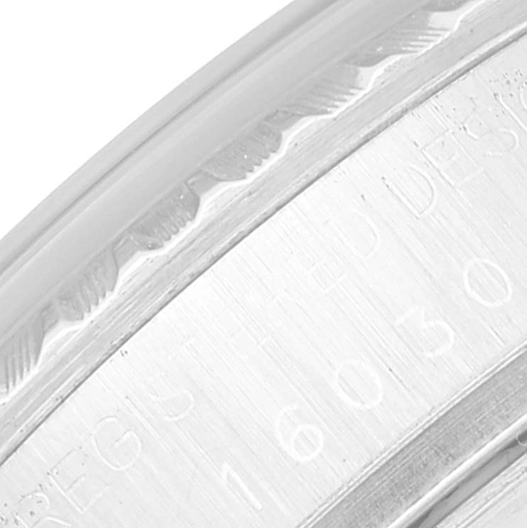 This close-up image shows the engraved inner bezel of a Rolex Datejust 16030 Men's Stainless Steel Silver Dial 16030 Men's Stainless Steel Silver Dial watch.