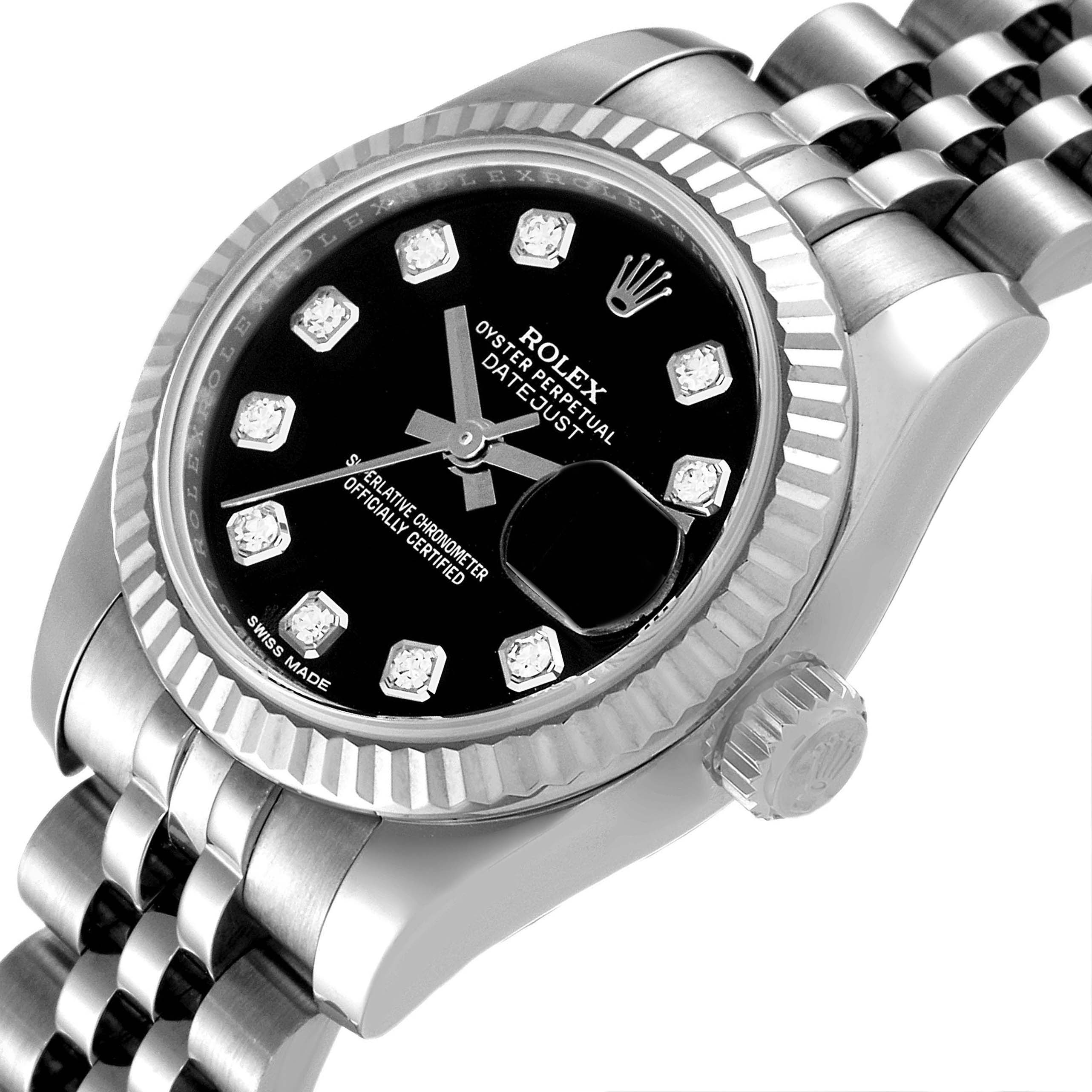 The image shows a close-up, angled view of the Rolex Datejust 179174 Women's Stainless Steel Black Dial 179174 Women's Stainless Steel Black Dial watch, highlighting the face, bezel, and partial bracelet.
