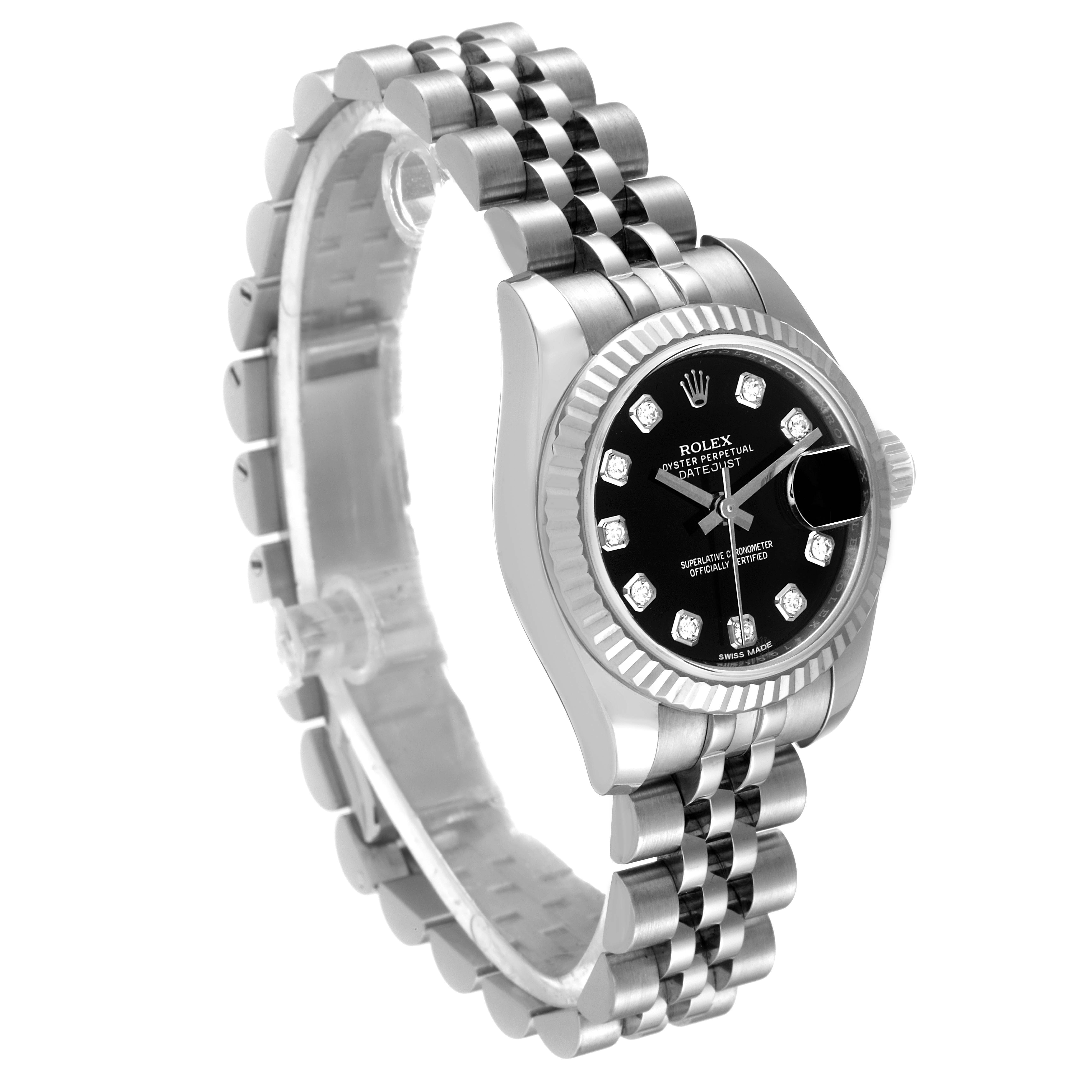 The Rolex Datejust 179174 Women's Stainless Steel Black Dial 179174 Women's Stainless Steel Black Dial watch is shown at a slightly angled side view, displaying the face, bezel, and bracelet.