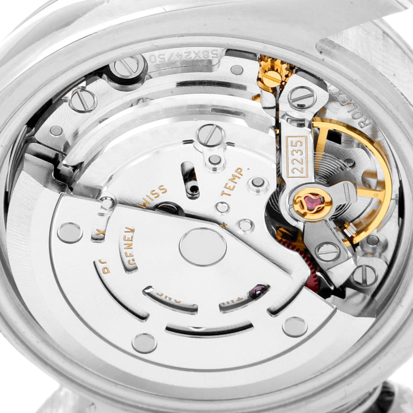 This image shows the internal movement of the Rolex Datejust 179174 Women's Stainless Steel Black Dial 179174 Women's Stainless Steel Black Dial watch at a close-up angle, highlighting the rotor and intricate mechanisms.