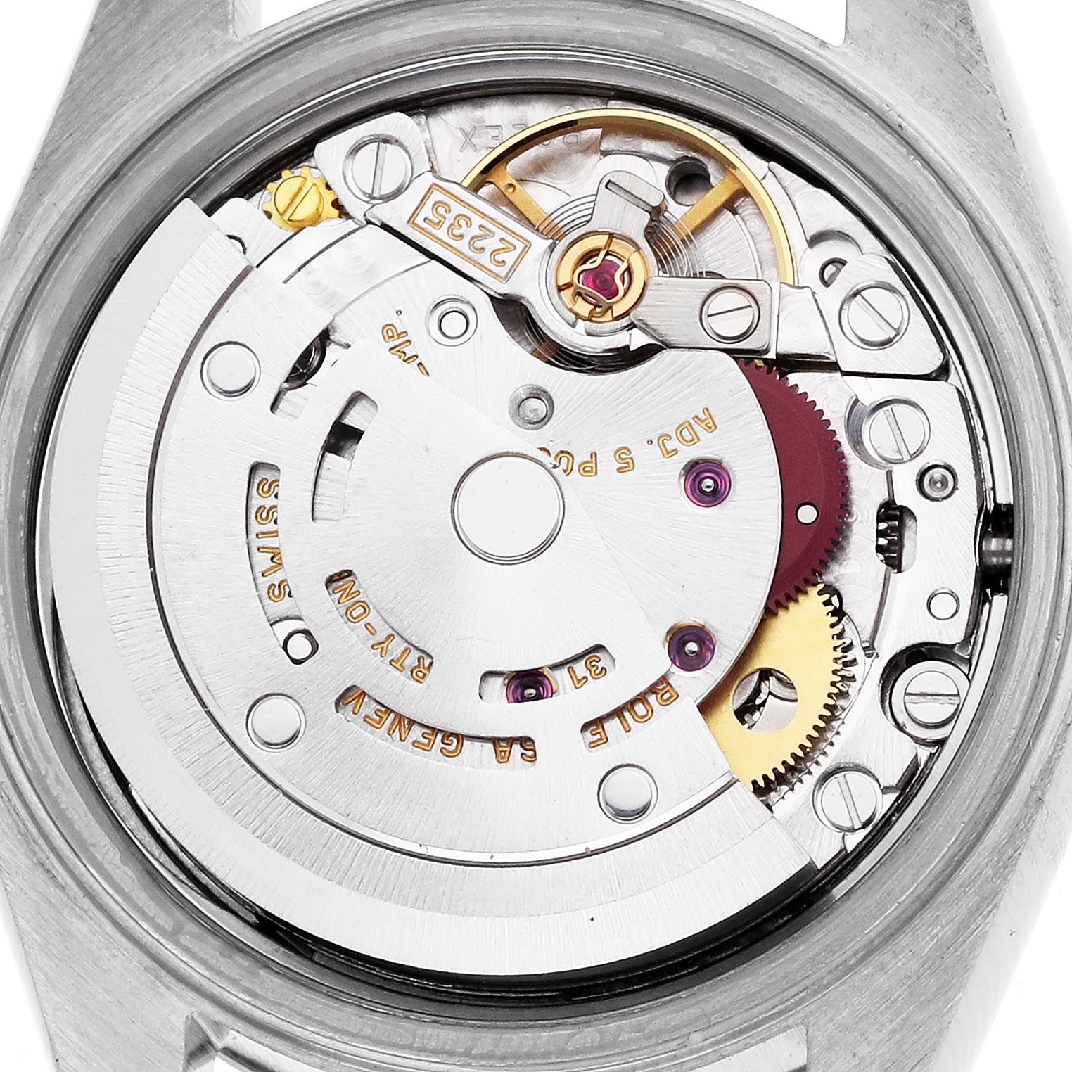 The image shows a detailed view of the Rolex Datejust 79173 Women's Steel and Gold (two tone) Champagne Dial 79173 Women's Steel and Gold (two tone) Champagne Dial's movement, focusing on the intricate inner mechanics from the back.