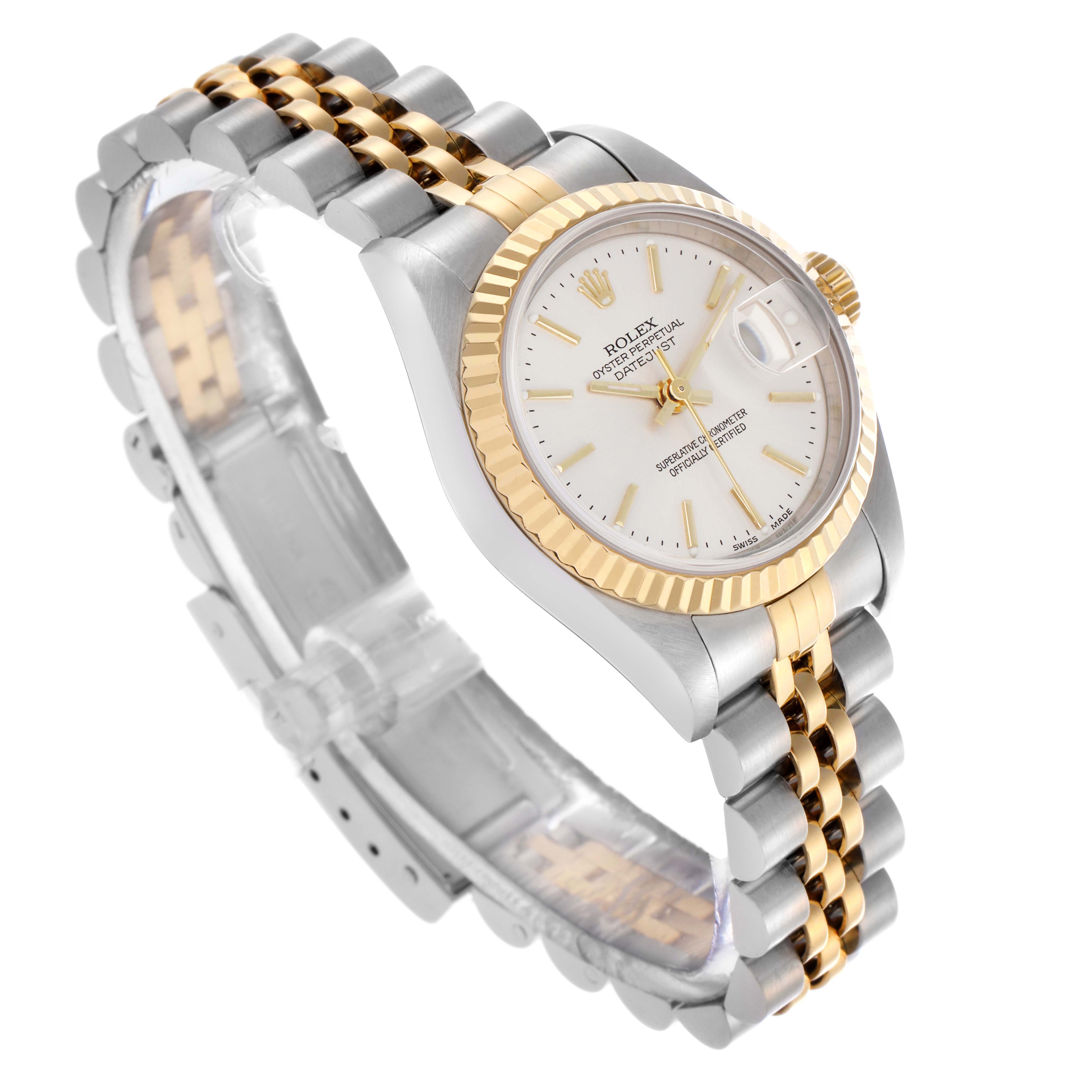 The Rolex Datejust 79173 Women's Steel and Gold (two tone) Silver Dial 79173 Women's Steel and Gold (two tone) Silver Dial watch is shown at a three-quarter angle, highlighting the fluted bezel, jubilee bracelet, and part of the dial.