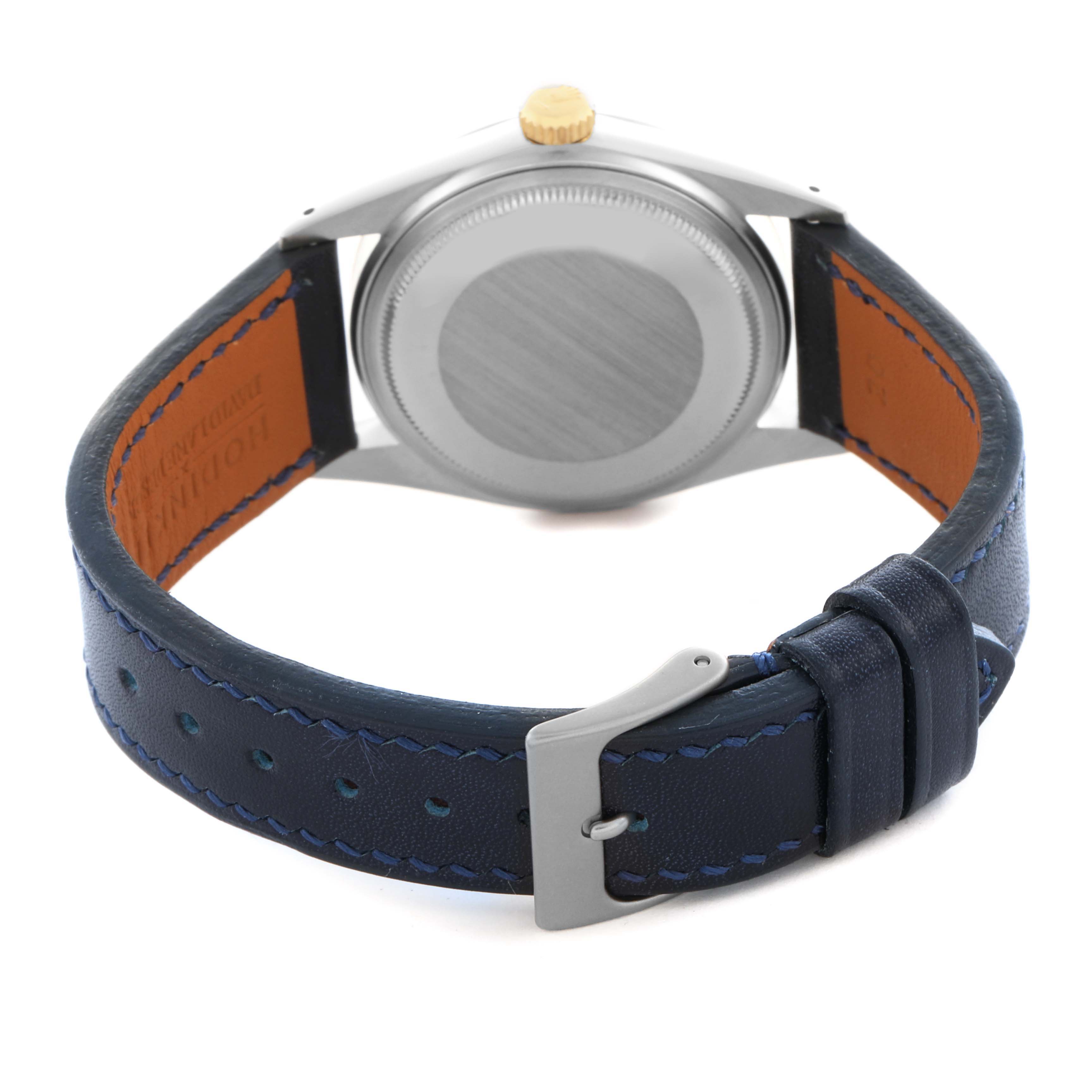 The image shows the back of a Rolex Datejust 16013 Men's Steel and Gold (two tone) Champagne Dial 16013 Men's Steel and Gold (two tone) Champagne Dial watch, highlighting the case back, lugs, and leather strap with buckle.