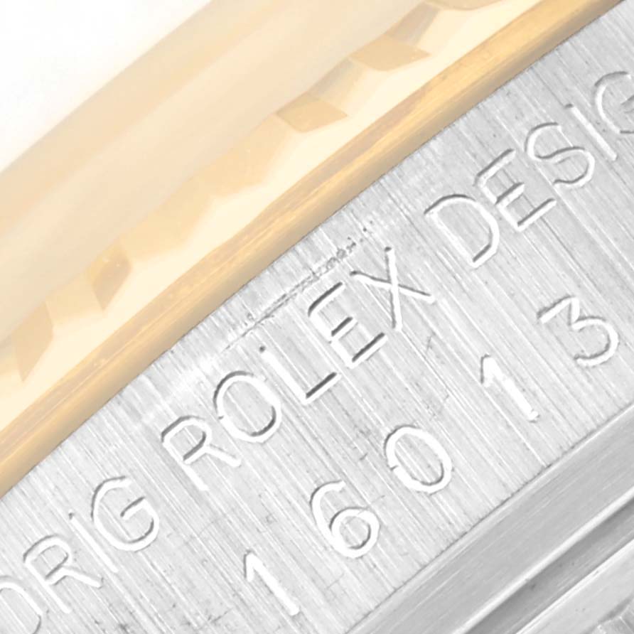 This close-up image shows the engraved side of the Rolex Vintage Collection 16013 Men's Steel and Gold (two tone) White Dial 16013 Men's Steel and Gold (two tone) White Dial model 16013.