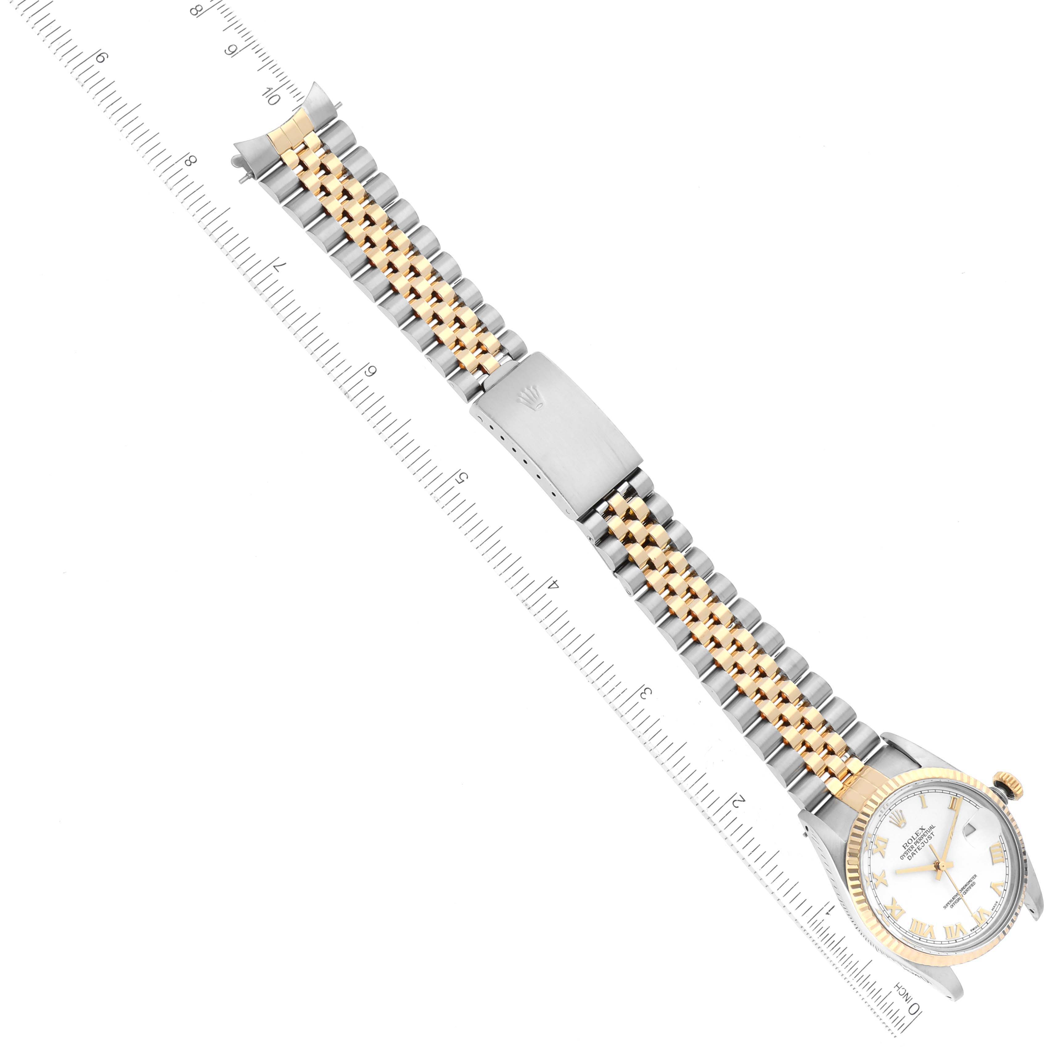 The image displays a top-down view of a Rolex Vintage Collection 16013 Men's Steel and Gold (two tone) White Dial 16013 Men's Steel and Gold (two tone) White Dial watch, showing its face, bezel, and two-tone bracelet with a clasp.