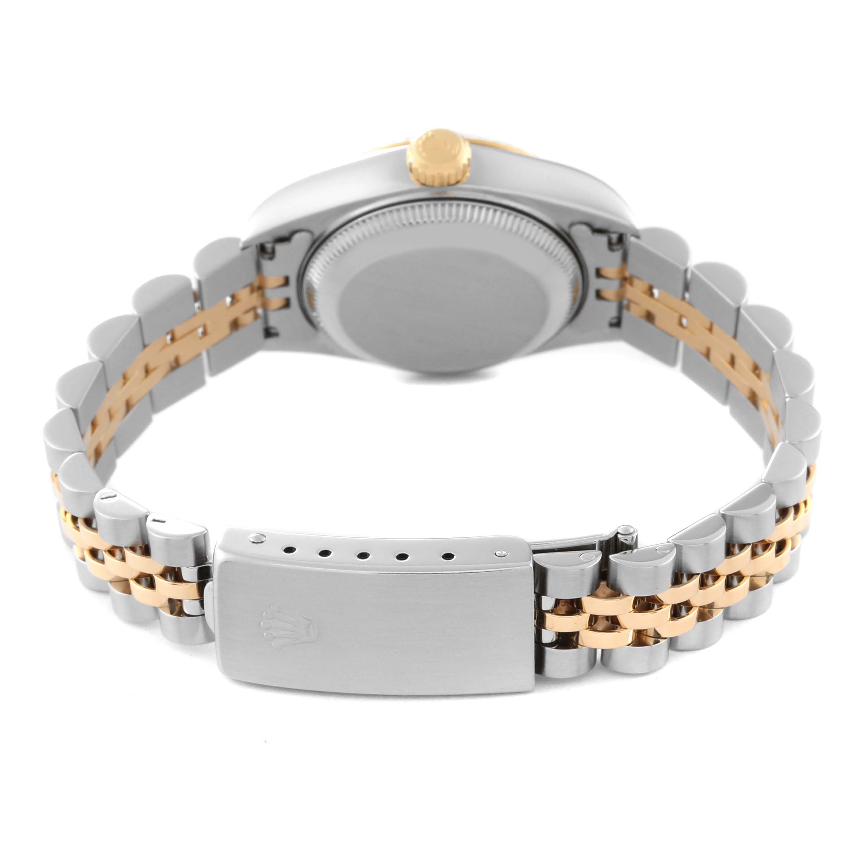 This image shows the back of a Rolex Datejust 69173 Women's Steel and Gold (two tone) White Dial 69173 Women's Steel and Gold (two tone) White Dial watch, including the case back, crown, and stainless steel and gold bracelet.
