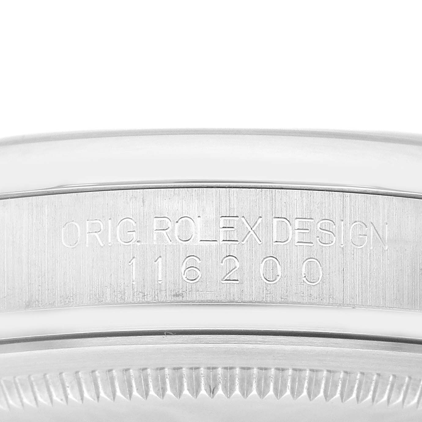 This image shows a close-up of the case side of a Rolex Datejust 116200 Men's Stainless Steel White Dial 116200 Men's Stainless Steel White Dial, displaying the model number 116200.